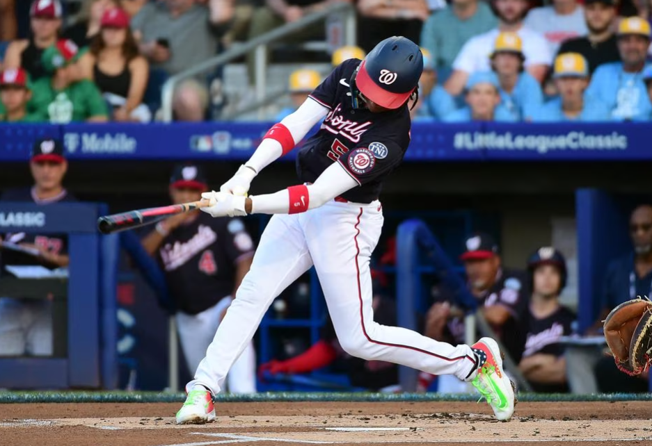 Washington Nationals shortstop CJ Abrams (5) singles in the first inning against the Philadelphia Phillies at Muncy Bank Ballpark at Historic Bowman Field in Williamsport, Pennsylvania, Aug. 20, 2023.