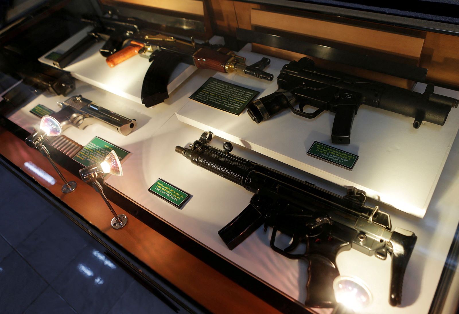 Guns are displayed in the Drugs Museum, used by the military to showcase to soldiers the lifestyles of Mexican drug lords, at the headquarters of the Ministry of Defense in Mexico City, October 14, 2016. REUTERS/Henry Romero/File Photo