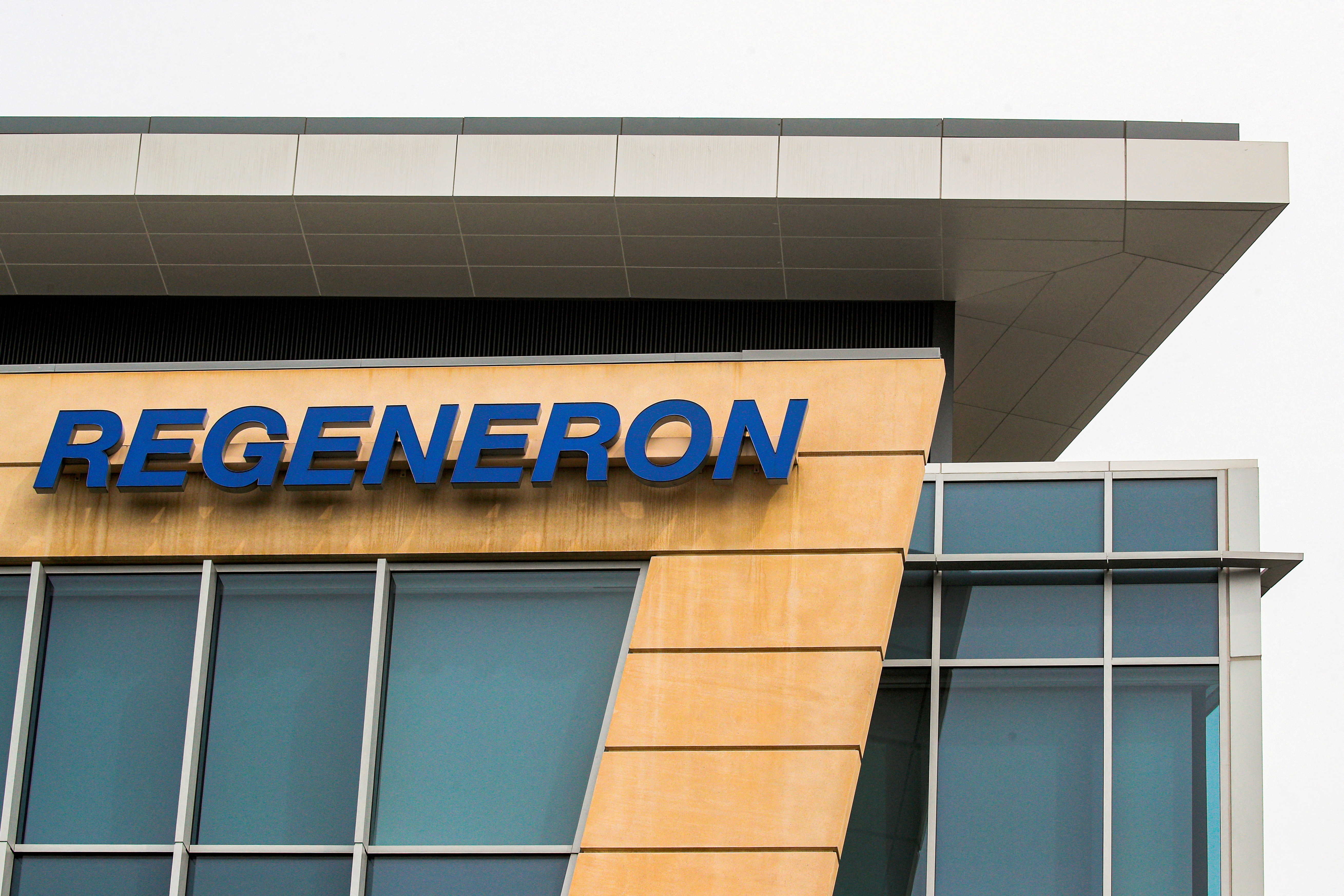 The Regeneron Pharmaceuticals company logo is seen on a building at the company's Westchester campus in Tarrytown, New York, U.S. September 17, 2020. REUTERS/Brendan McDermid/File Photo
