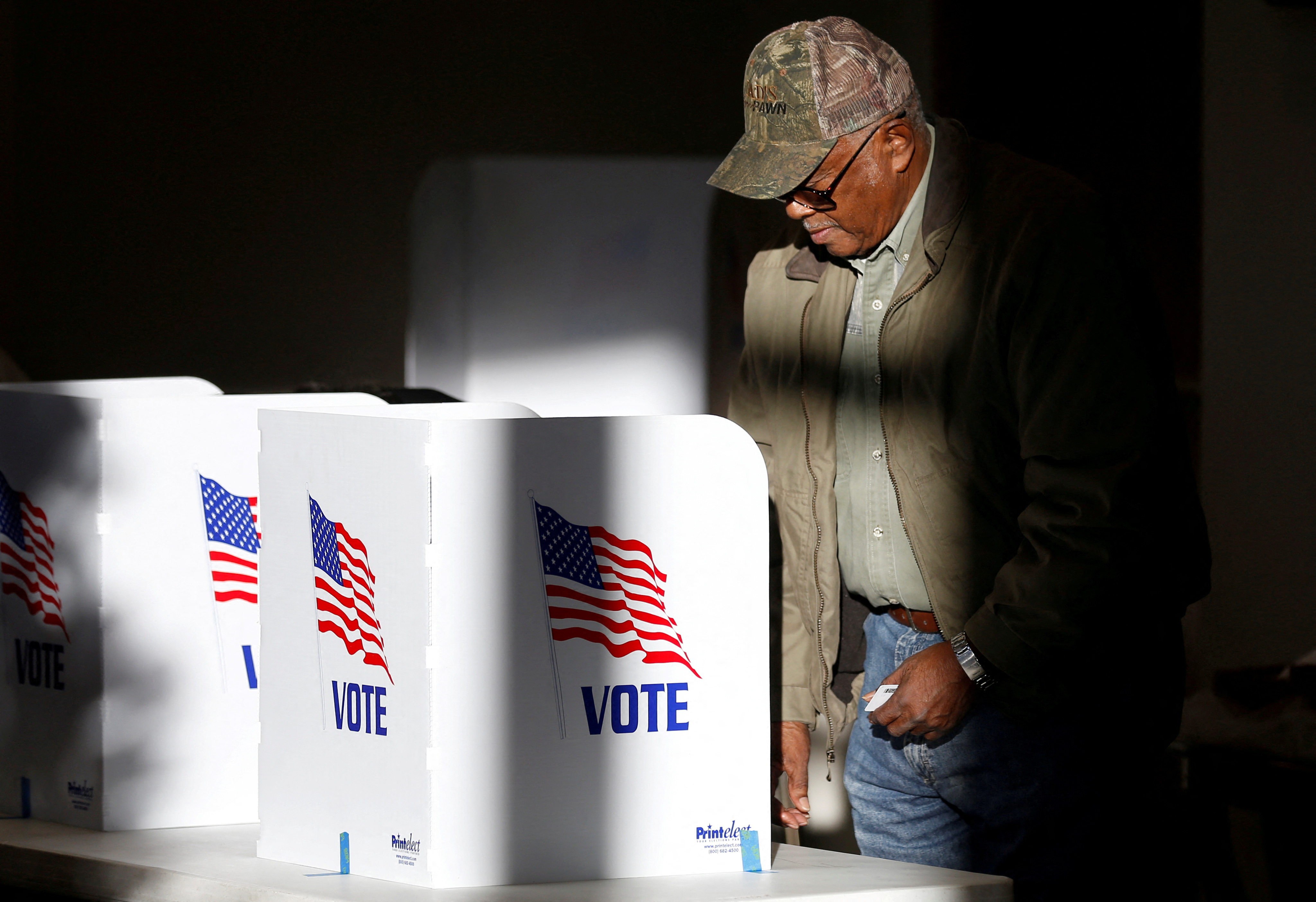 A voter casts his ballot at a polling station in Ridgeland, Mississippi, U.S., November 27, 2018. REUTERS/Jonathan Bachman/File Photo