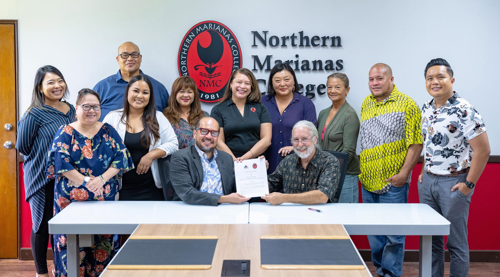 Northern Marianas College’s Community Development Institute has recently signed an agreement with 500 Sails. The partnership will offer cultural maritime education programs, including basic seamanship training, traditional canoe fabrication and repair, and traditional sailing and voyaging. Pictured here are NMC President Galvin Deleon Guerrero, EdD, 500 Sails Acting Executive Director Peter Perez, NMC Community Development Institute Director Monique Sablan, NMC Community Development Institute Program Manager Geraldine Sasamoto, NMC Interim Dean of Academic Programs and Services Lorraine Maui, NMC Dean of Student Support Services Charlotte Cepeda, NMC Chief Financial Officer Dave Attao, CNMI Small Business Development Center Network Director Nadine Deleon Guerrero, NMC Executive Director of the Office of the President Kevin Bautista, 500 Sails Managing Director Kuen-Hee Han, 500 Sails Program Coordinator Andrea Carr, and 500 Sails Director of Sailing and Seamanship Jun Coleman.