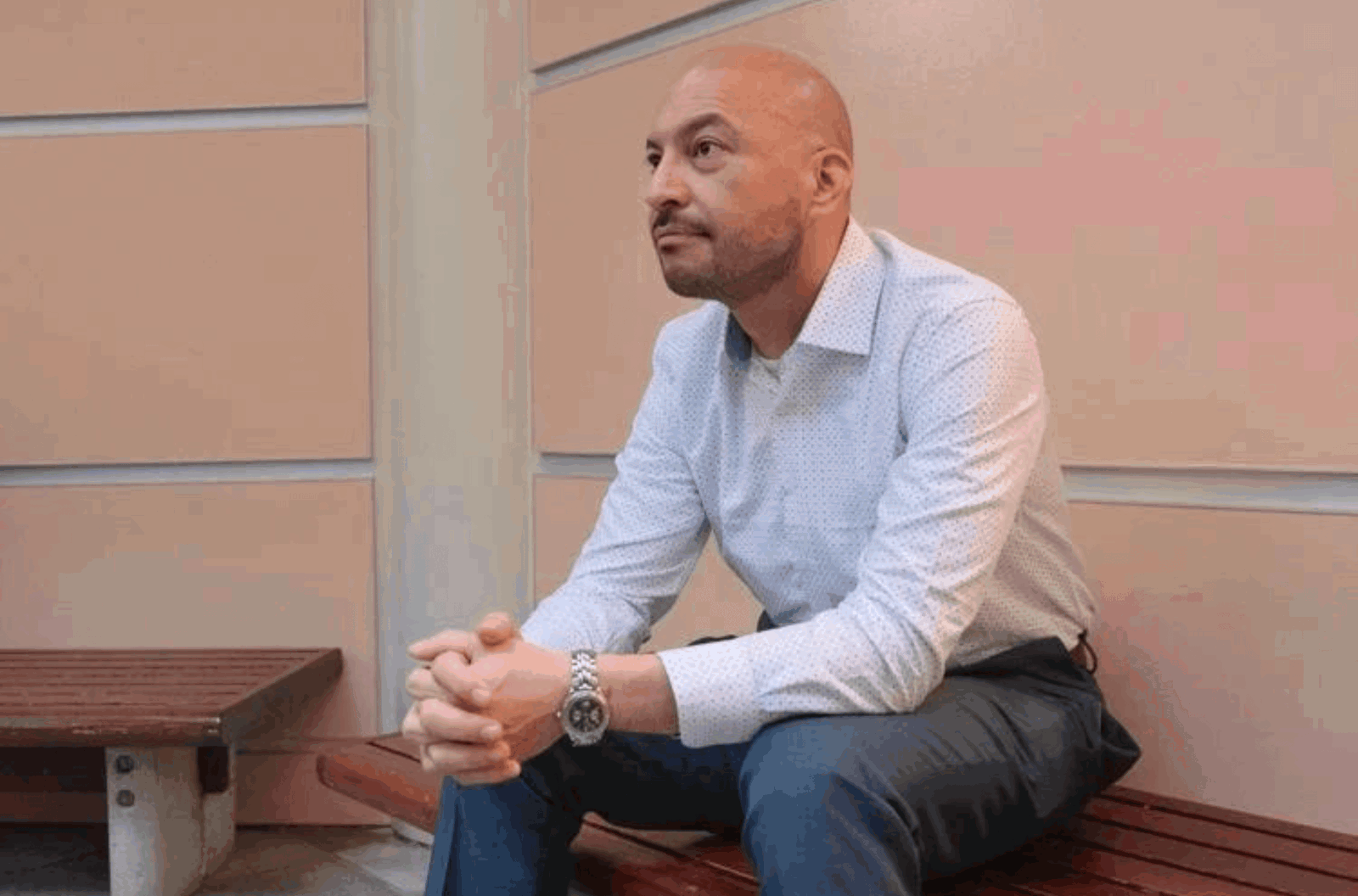 Adrian Cruz waits outside a courtroom in the Superior Court of Guam in Hagåtña on Tuesday, Aug. 22, 2023.
