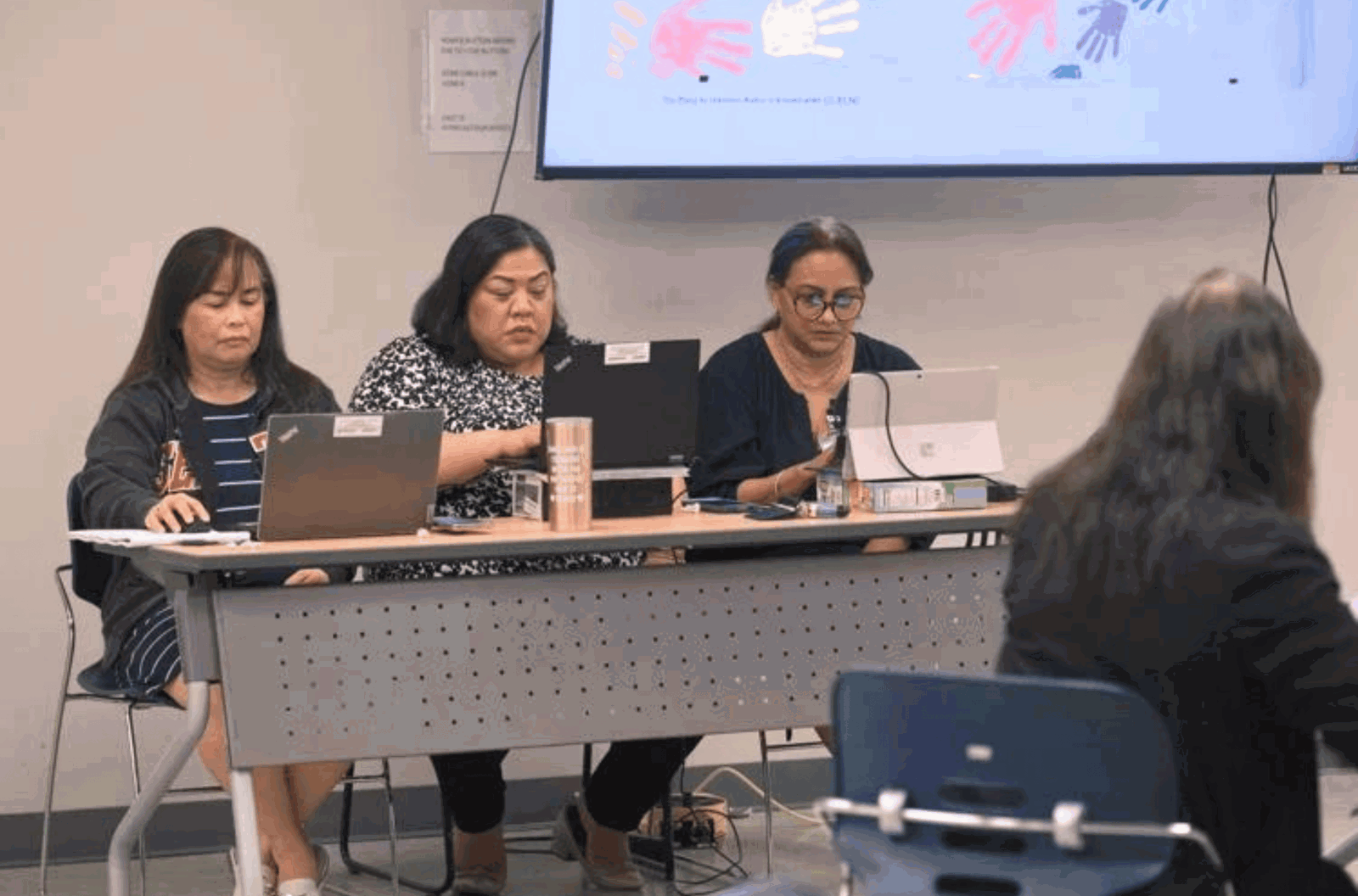 Guam Department of Education Division of Special Education program leads Terese Crisostomo, left, Norine Guzman, center, and Judy Roberto attend a virtual town hall meeting Thursday, Aug. 10, 2023.
