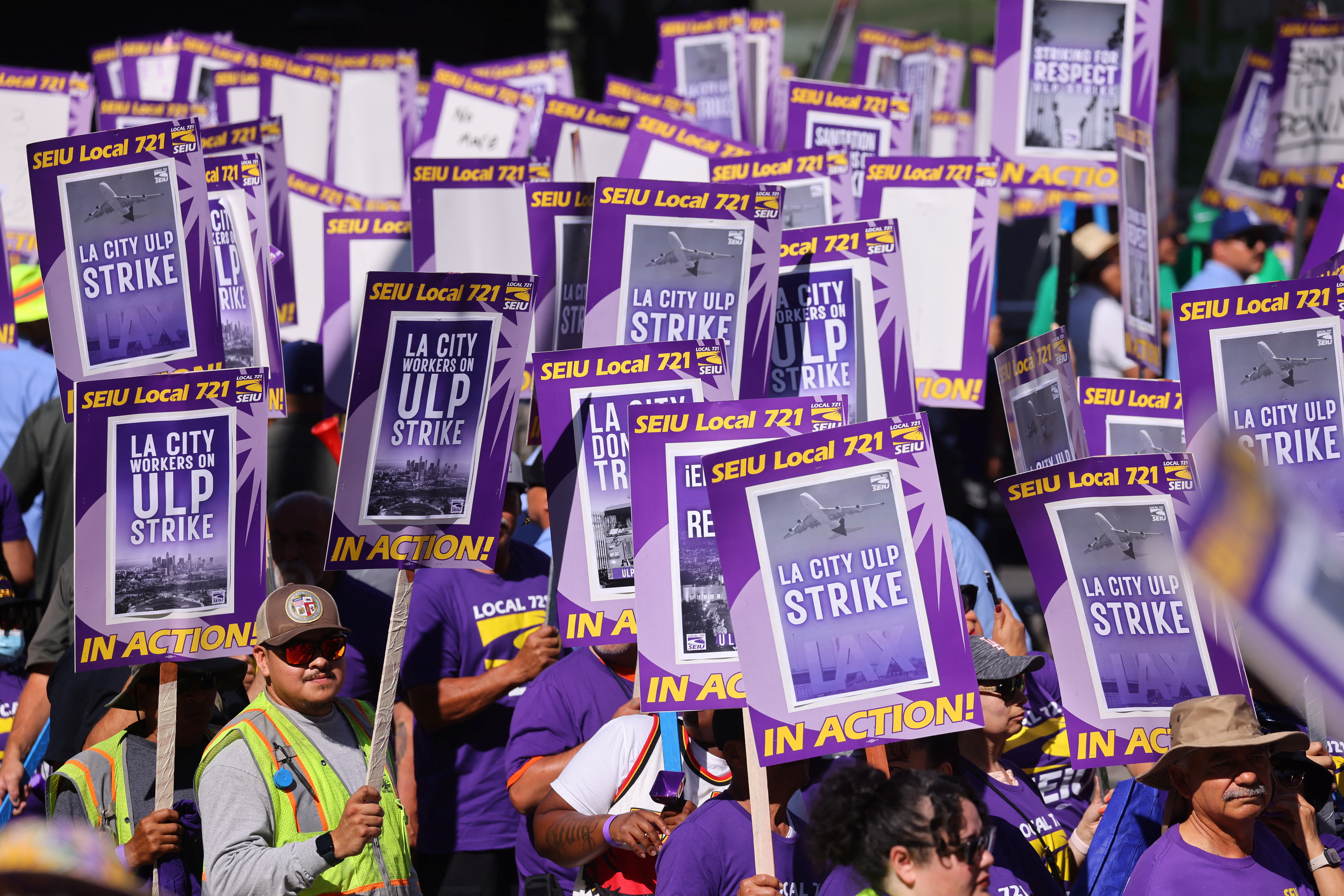 Los Angeles city workers hold a rally outside the city hall during a one-day walkout strike in protest over labor negotiations, in Los Angeles, California, U.S., August 8, 2023. REUTERS/Mike Blake