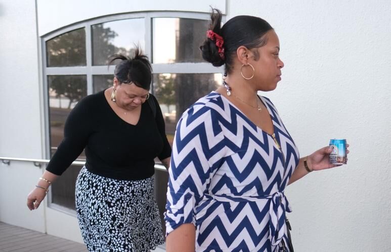 Monique Jones, left, and Mekayda Jones enter the District Court of Guam on Feb. 8, 2023. 