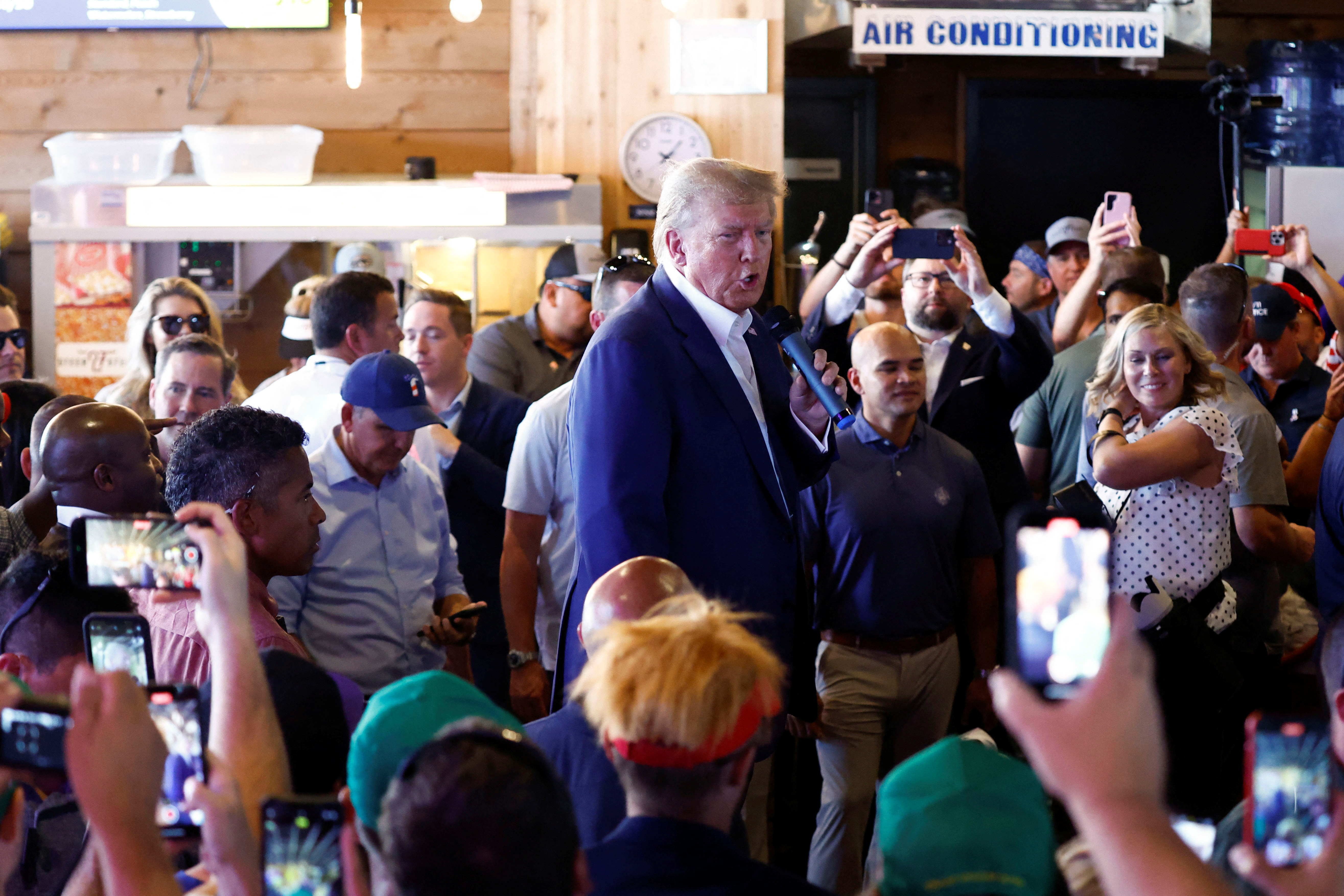 Republican presidential candidate and former U.S. President Donald Trump speaks as he campaigns at the Iowa State Fair in Des Moines, Iowa, U.S. August 12, 2023. REUTERS/Evelyn Hockstein