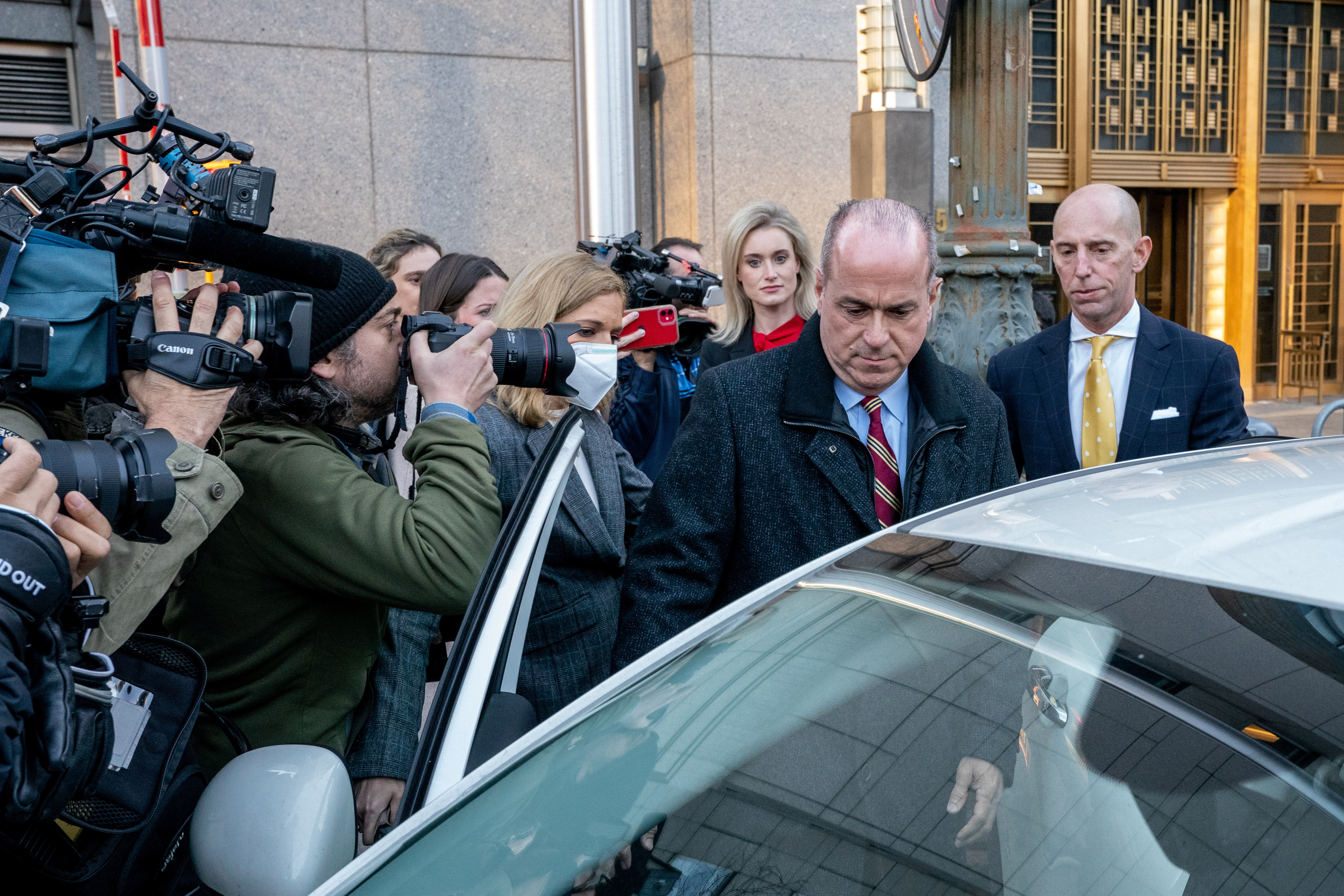 Ed Mullins, former president of the NYPD Sergeants Benevolent Association (SBA), exits following his initial court appearance for defrauding a union, at the United States Courthouse in the Manhattan borough of New York City, U.S., February 23, 2022. REUTERS/David 'Dee' Delgado/File Photo