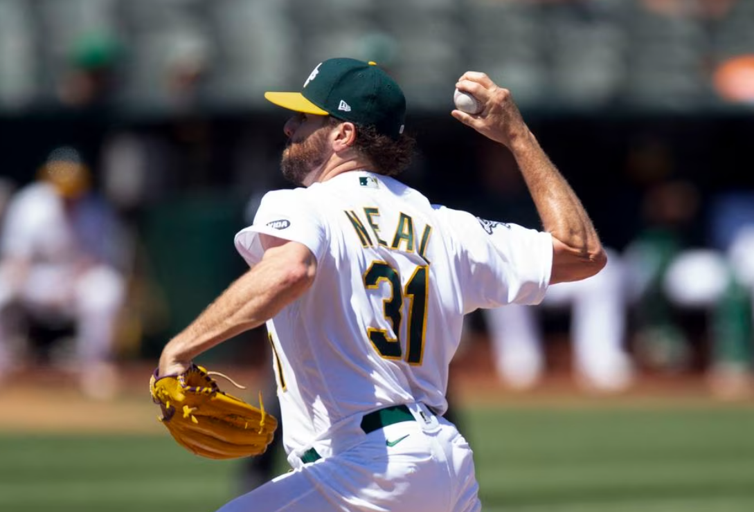 Oakland Athletics pitcher Zach Neal (31) delivers a pitch against the Baltimore Orioles during the fifth inning at Oakland-Alameda County Coliseum in Oakland, California, Aug. 20, 2023.