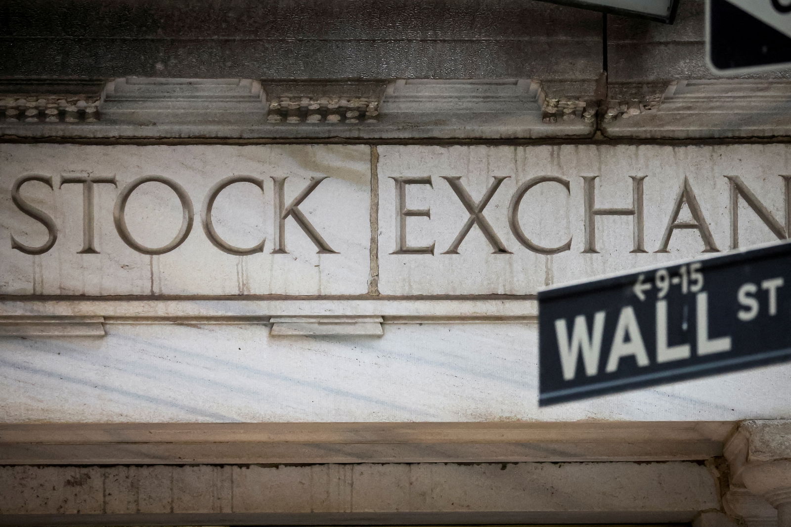 The Wall Street entrance to the New York Stock Exchange (NYSE) is seen in New York City, U.S., November 15, 2022. REUTERS/Brendan McDermid/File Photo