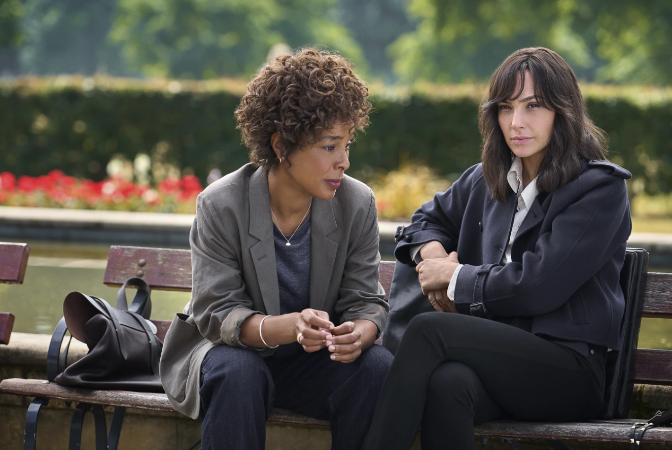 Sophie Okonedo, left, and Gal Gadot in a scene from “Heart of Stone.”
