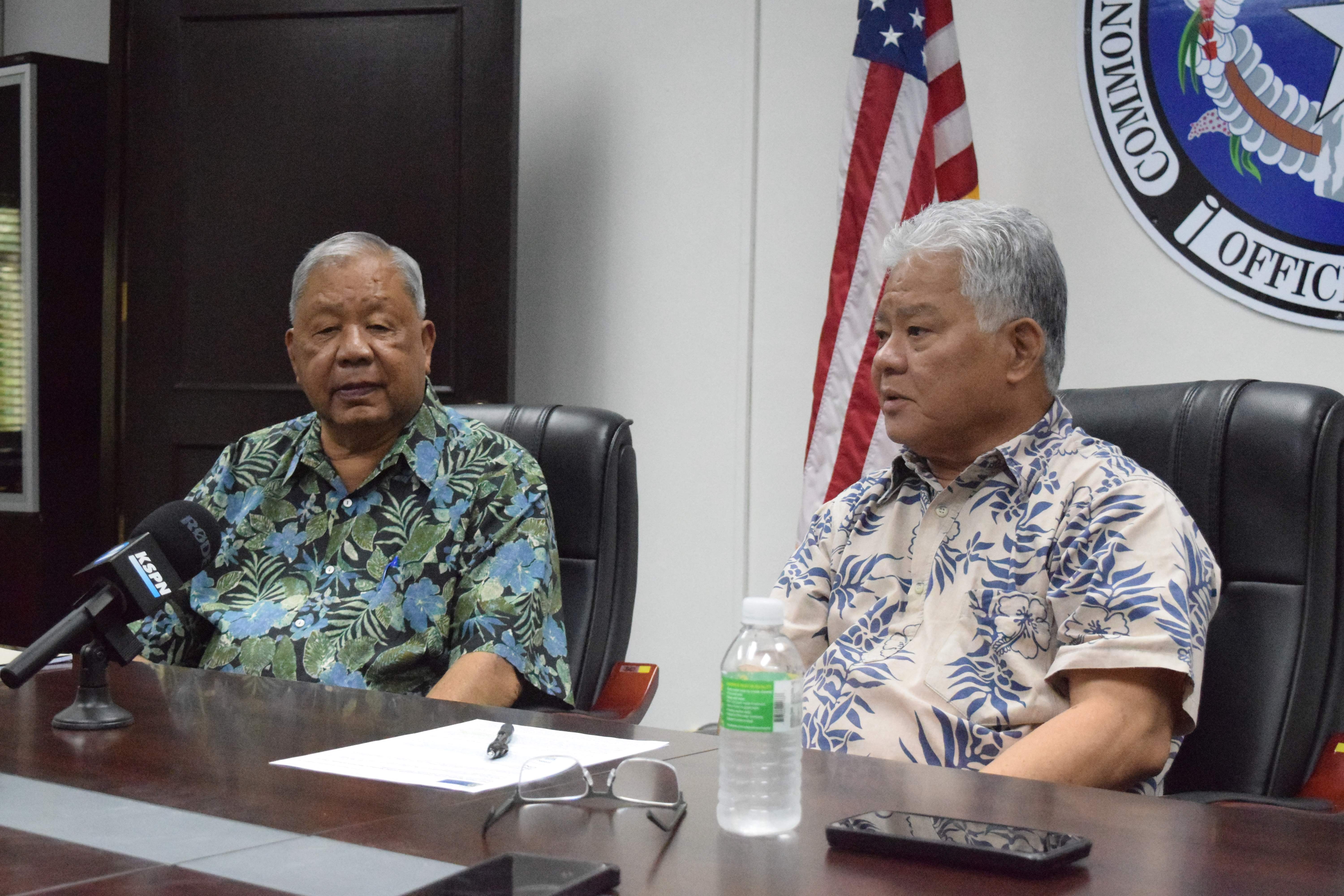 Gov. Arnold I. Palacios, right, and Lt. Gov. David M. Apatang conduct a press conference at the governor’s office on Monday.