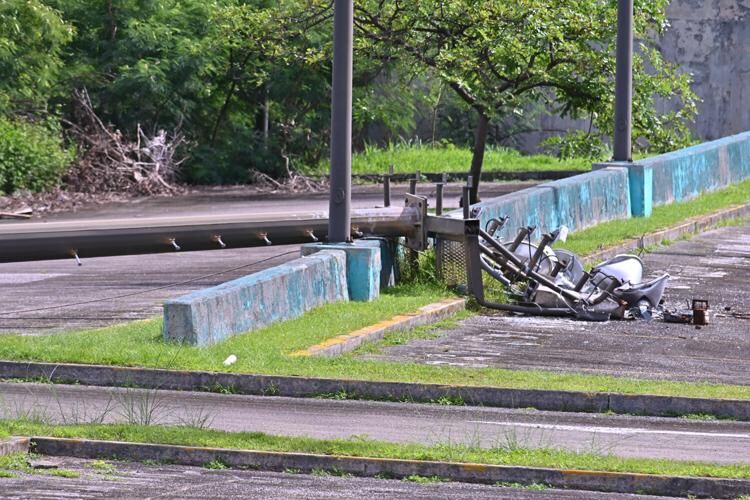Pieces of a light tower are strewn across part of a parking lot Wednesday, Aug. 2, 2023, at Southern High School in Sånta Rita-Sumai.