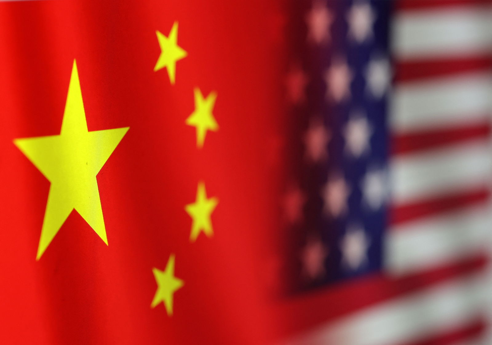 U.S. and Chinese flags are seen in this illustration taken, January 30, 2023. REUTERS/Dado Ruvic/Illustration/File Photo