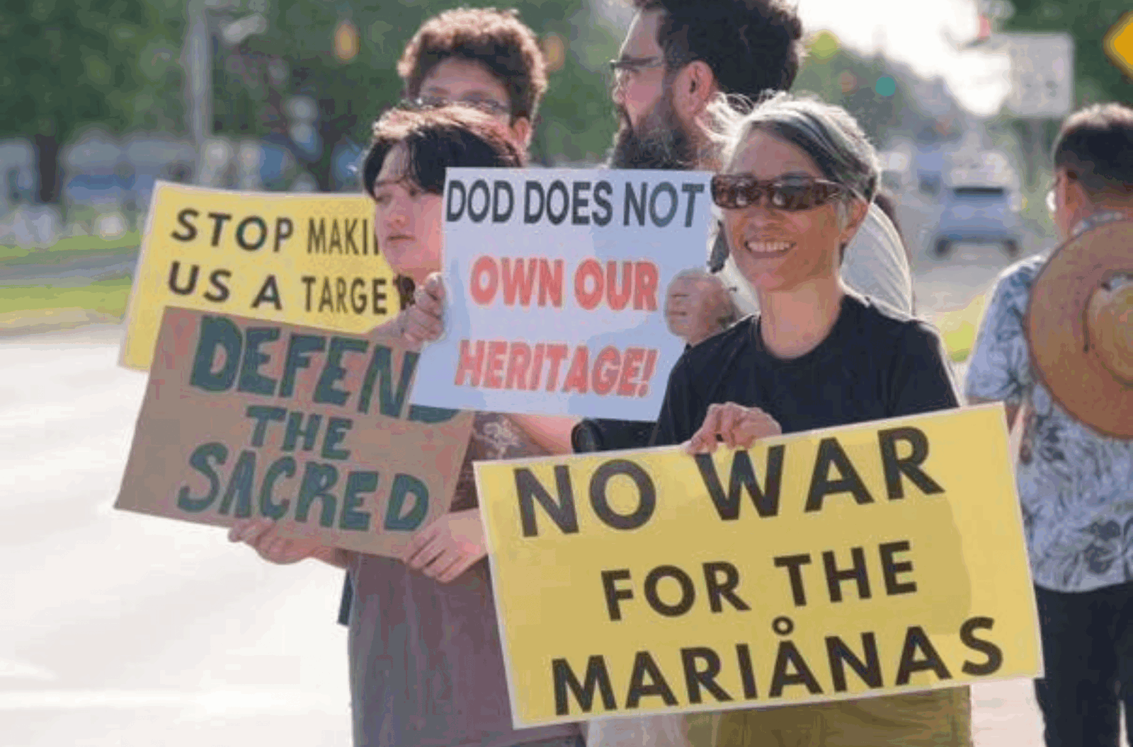 Joni Quenga Kerr participates in peace wave against a Guam missile defense system Friday, Aug. 18, 2023, at Chief Kepuha Park in Hagåtña.