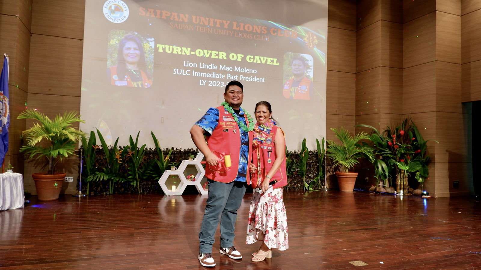 The turn over of the gavel from Immediate Past President Lion Lindie Moleno to President Lion Bongbong Martinez.