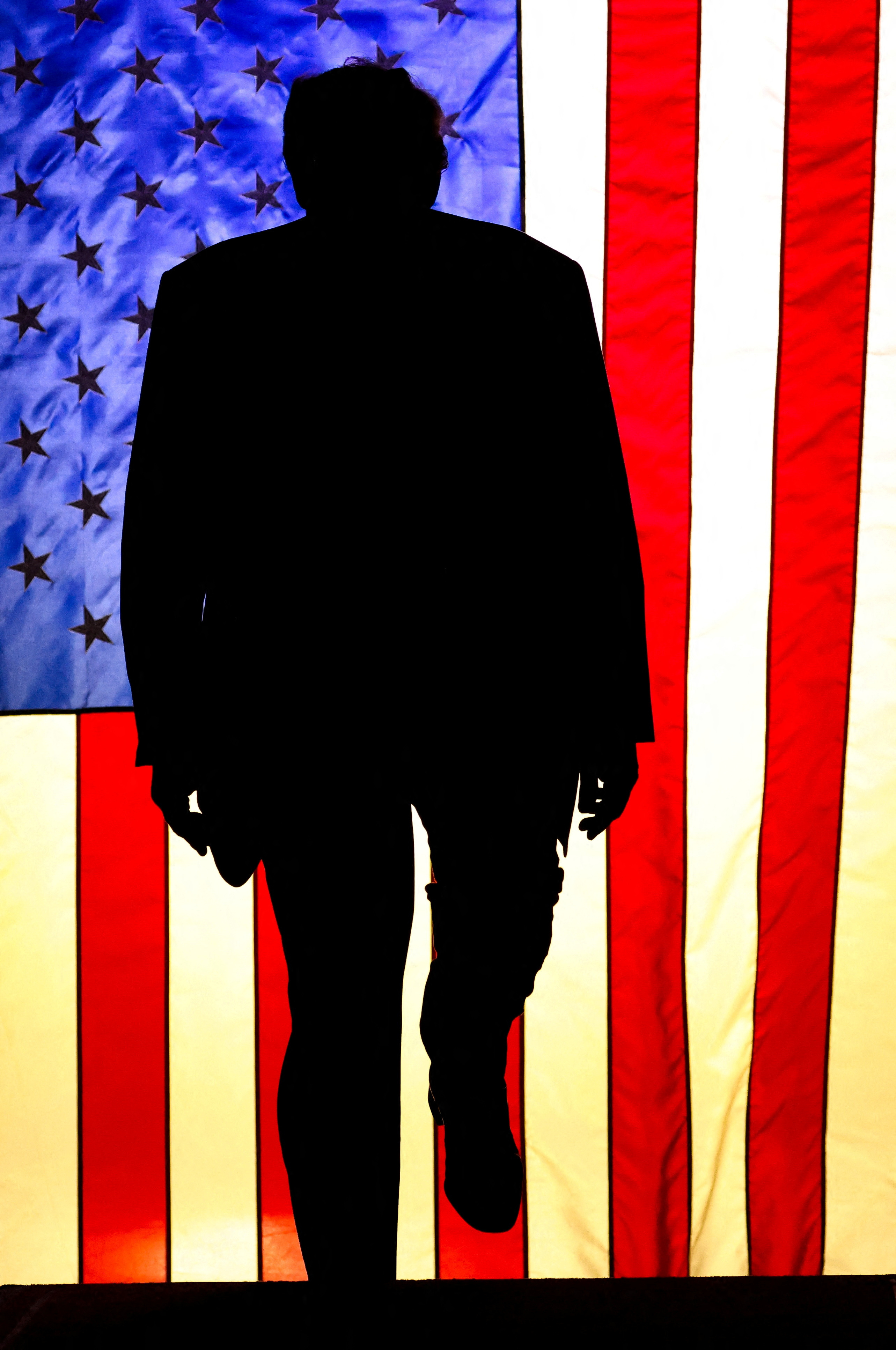 Former U.S. President and Republican presidential candidate Donald Trump takes the stage during a campaign rally in Erie, Pennsylvania, U.S., July 29, 2023. REUTERS/Lindsay DeDario/File Photo