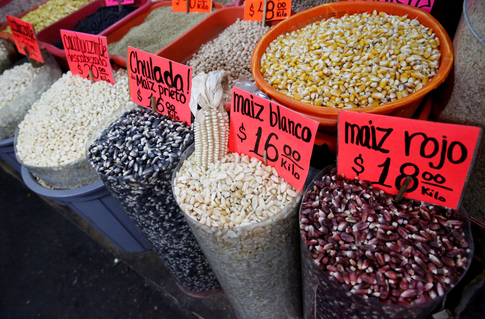 Sacks of different varieties of corn grain are displayed at a market in Mexico City, Mexico, May 19, 2017. REUTERS/Henry Romero/File Photo