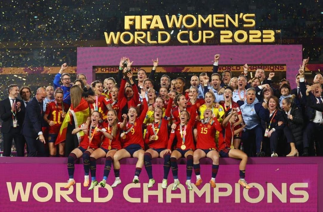 Spain’s players celebrate with the trophy after beating England to win the Women’s World Cup at Stadium Australia in Sydney, Australia, Aug. 20, 2023.