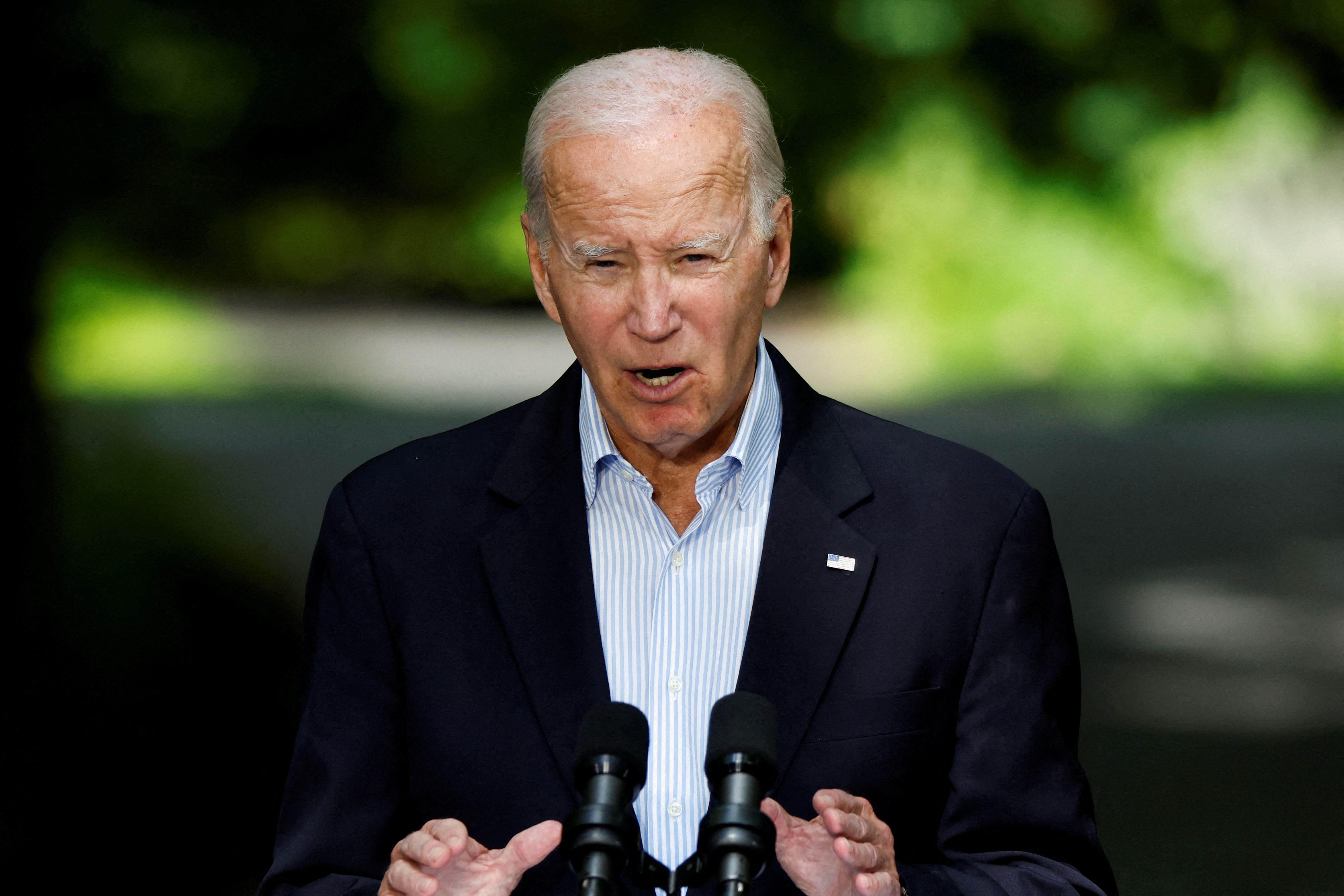 U.S. President Joe Biden speaks during a joint press conference with Japanese Prime Minister Fumio Kishida and South Korean President Yoon Suk Yeol (not pictured) during the trilateral summit at Camp David near Thurmont, Maryland, U.S., August 18, 2023. REUTERS/Evelyn Hockstein/File Photo