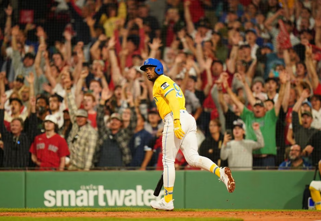 Boston Red Sox shortstop Pablo Reyes (19) hits a grand slam to end the game against the Kansas City Royals in the ninth inning at Fenway Park in Boston, Massachusetts,  Aug. 7, 2023.