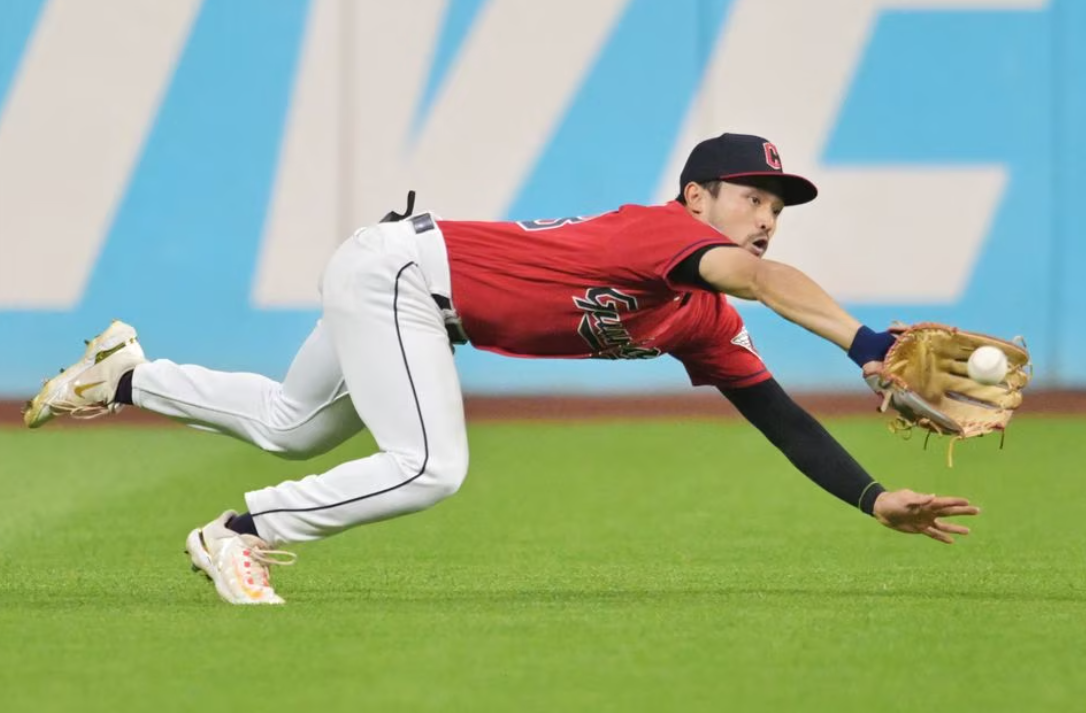 Cleveland Guardians left fielder Steven Kwan (38) catches a ball hit by Chicago White Sox center fielder Luis Robert Jr. (not pictured) during the ninth inning at Progressive Field in Cleveland, Ohio, Aug. 5, 2023.
