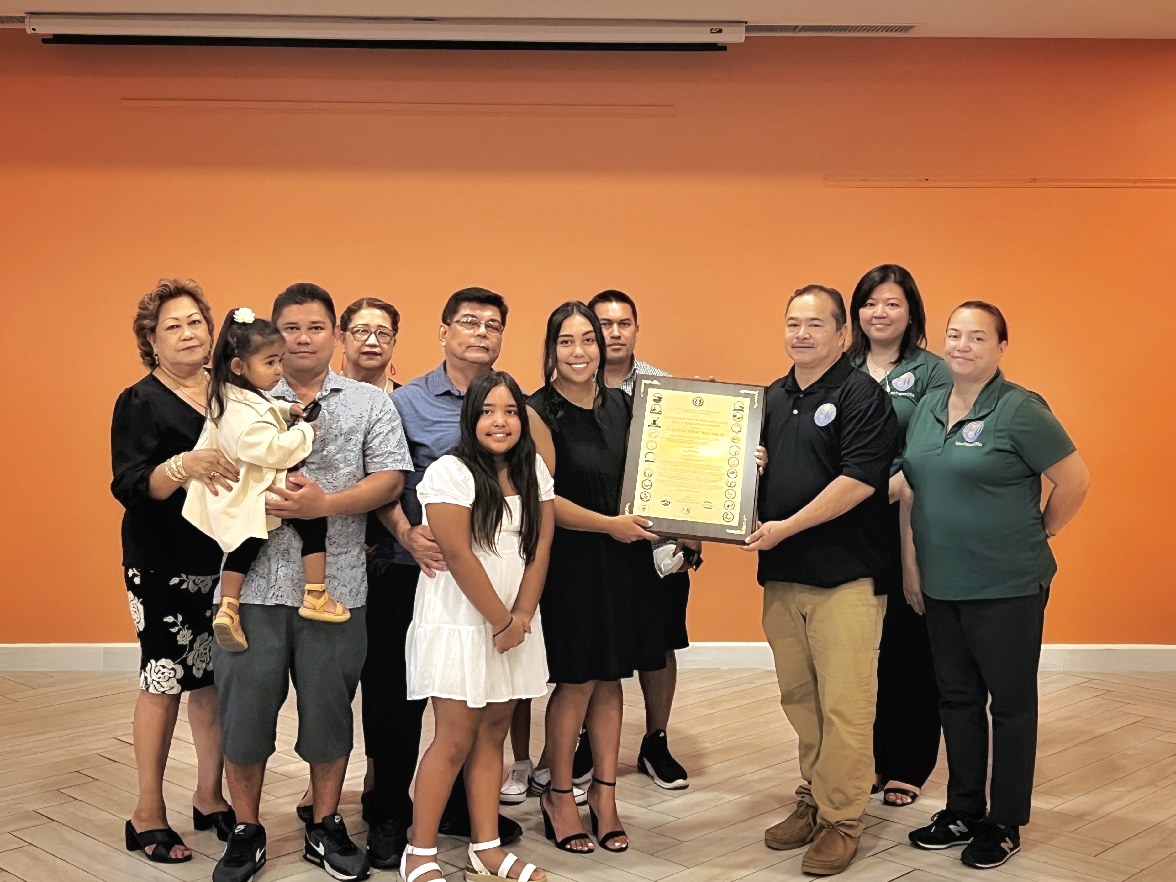 The family members of the late educator Joaquina Deleon Guerrero “Kinai” Salas receive an award from Commissioner of Education Dr. Alfred B. Ada, Federal Programs Officer Jacqueline Che, and Melisha San Nicolas, director of Private School Equitable Services and co-ombudsman.
