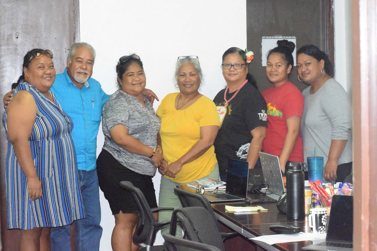 Carolinian Affairs Office Executive Assistant Felix Nogis, second left, with Carolinian Bilingual Recruitment Task Force members, from left, Tina Kaipat, Rachel Aiken, Gloria Rasiang, Fidelina Mafnas, Iunisi Pomee and Camilla Pua in the CAO conference room on Wednesday. Not in the photo are the other task force members, Claire Cabrera and Monica Pua.
