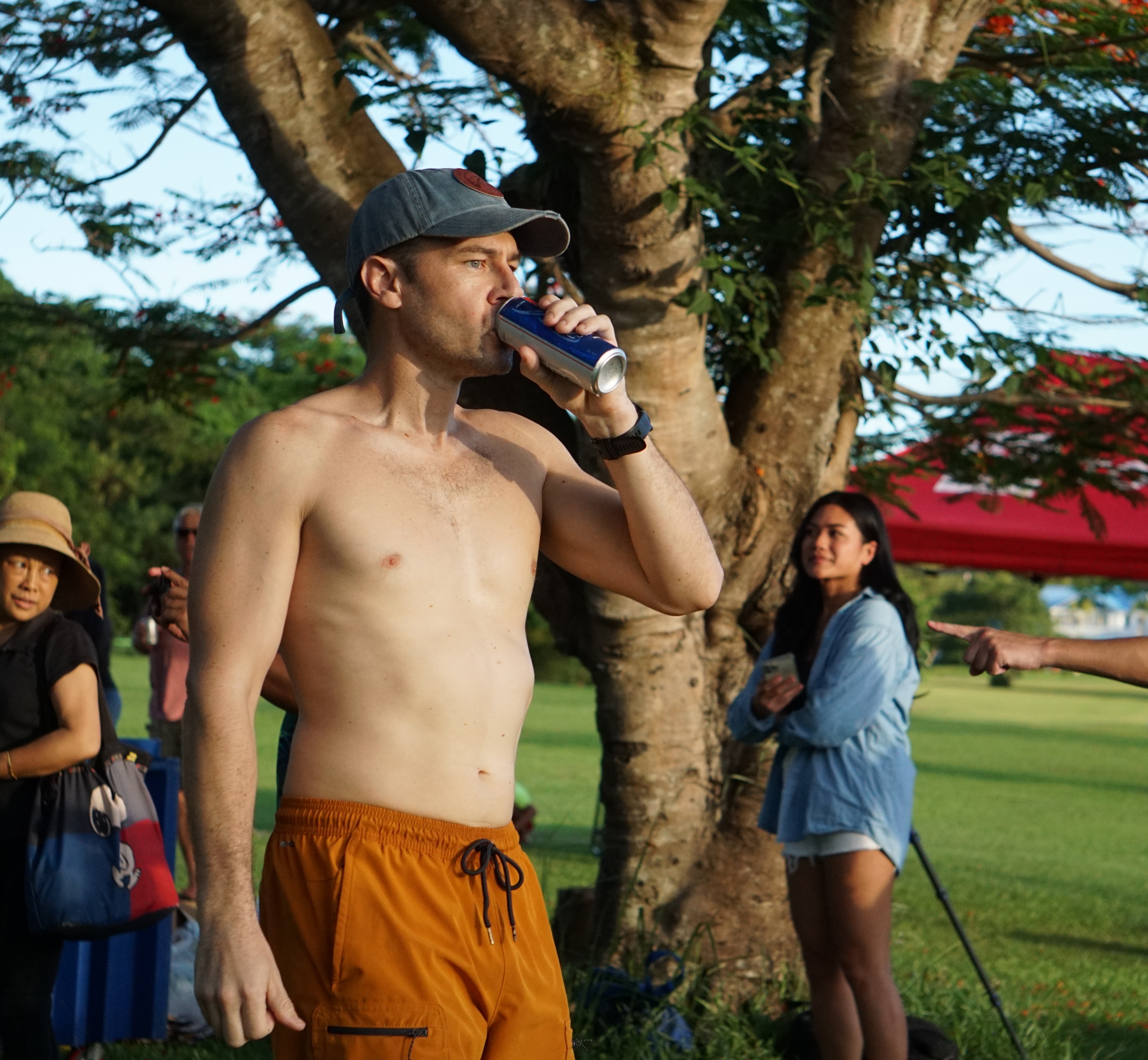 Matthew Giovannoni finishes his last can of Michelob Ultra during the 2nd Annual Michelob Ultra Beer Mile on Friday at Saipan Vegas golf course.