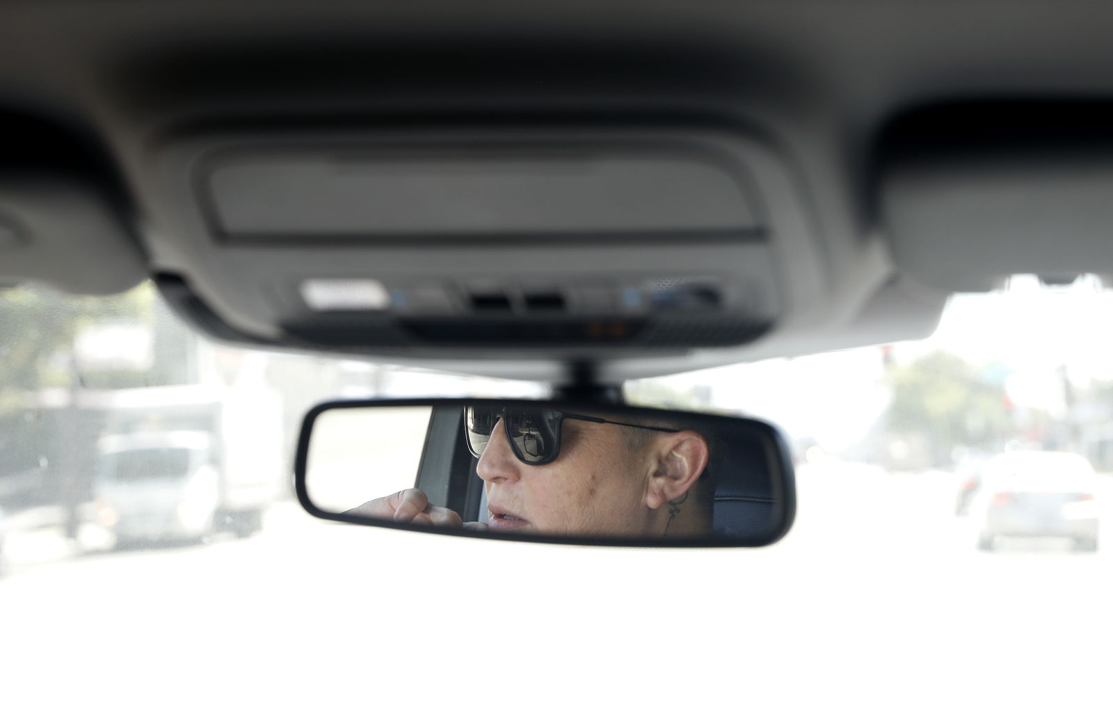 Crisis interventionist Vicki Lucas drives the streets of Pasadena, California, in search of Sherry Hill's daughter on July 21, 2023. (Christina House/Los Angeles Times/TNS)