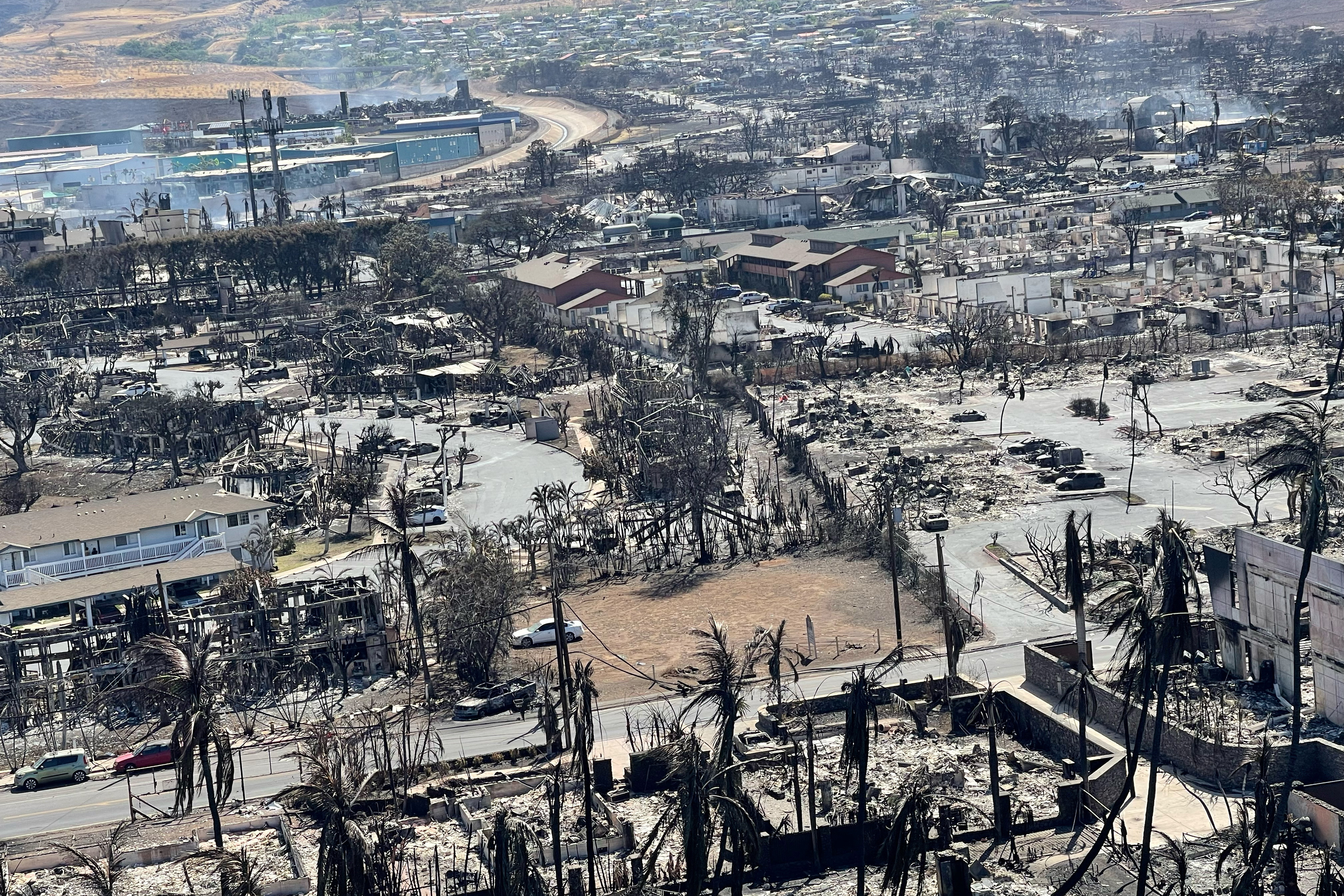 The shells of burned houses and buildings are left after wildfires driven by high winds burned across most of the town in Lahaina, Maui, Hawaii, Aug.  11, 2023.