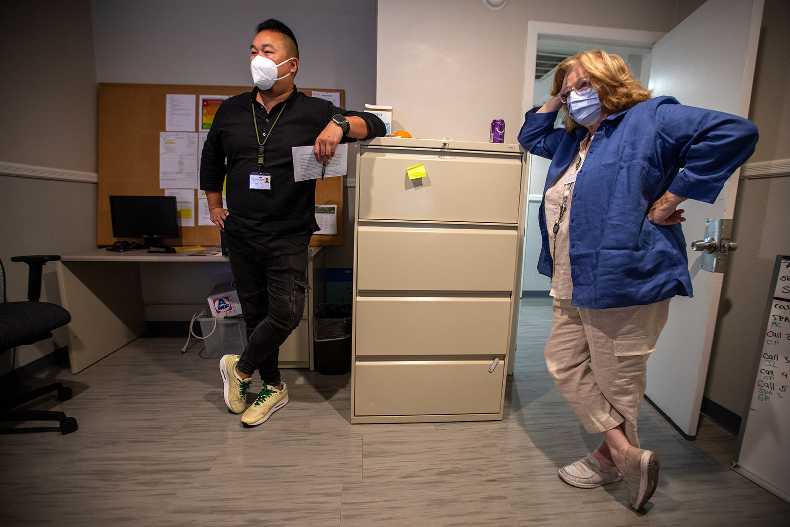 Luwin Kwan, left, a licensed clinician, and Suzanne Dewalt, a peer support specialist, at Sycamores in Altadena as they wait to get sent out on a crisis call to assist people dealing with mental health issues. (Francine Orr/Los Angeles Times/TNS)