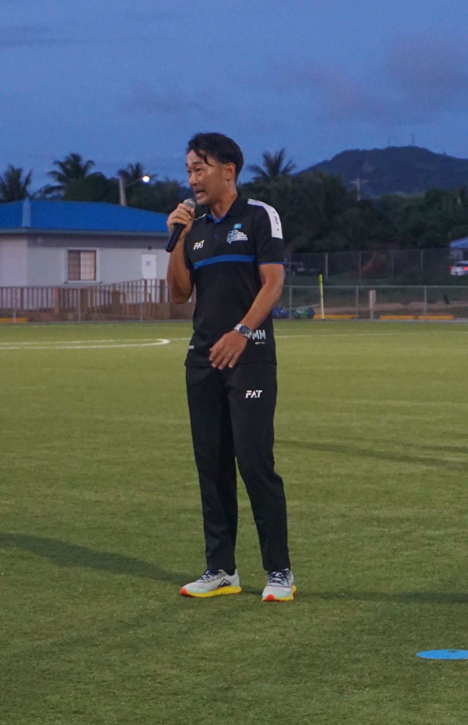 Head coach Michiteru Mita speaks during a send-off ceremony hosted by the NMI Football Association on Monday at the NMI Soccer Training Center in Koblerville.