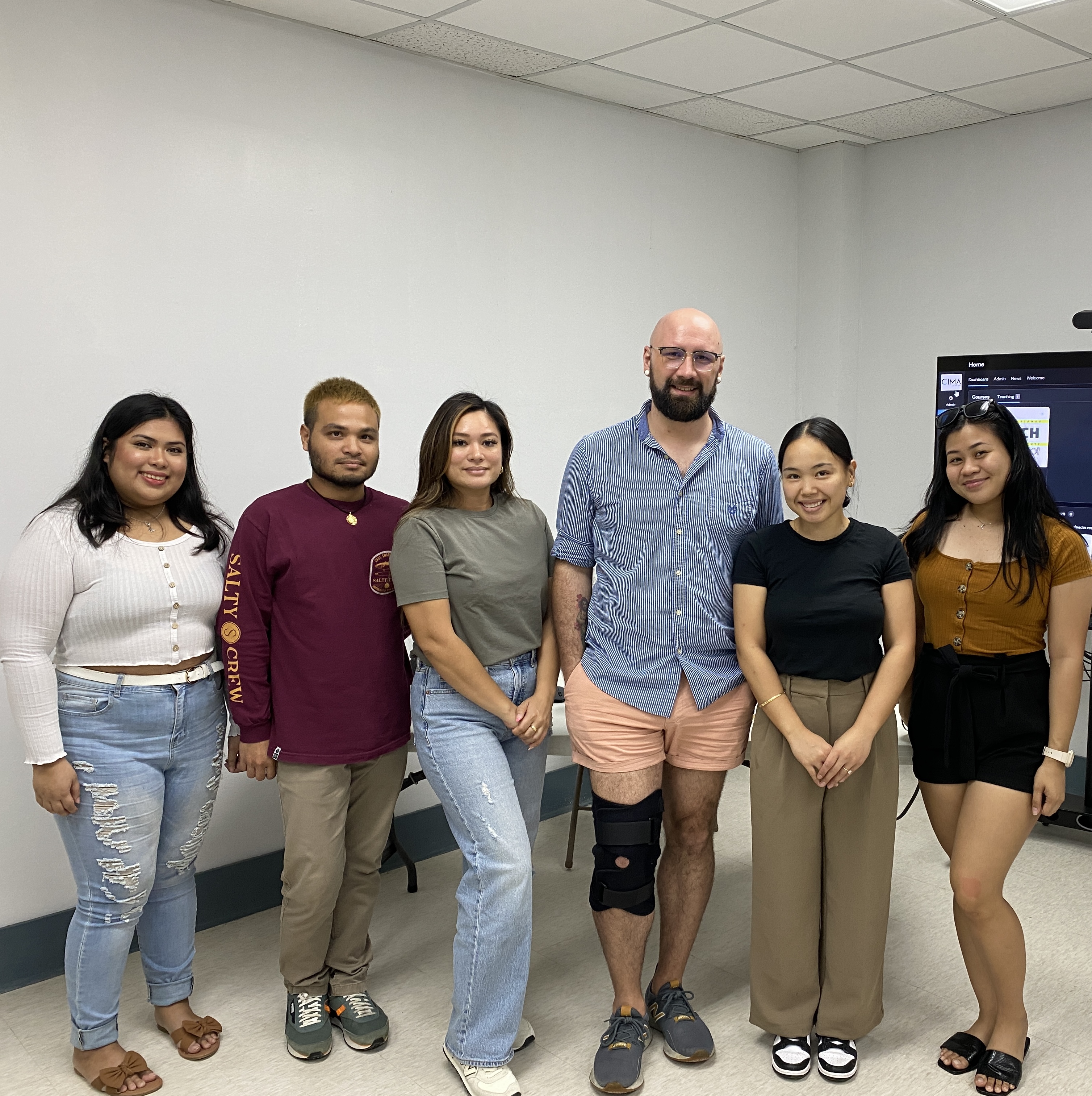 Cosmetology students and their instructors pose for a photo prior to the start of class at NMI Technical Institute. From left, Jelleen Narciso, student; Frankie Castro, student; Hannah Blanco, student; Kurt Ellis, instructor; Kristin Hofschneider, instructor; DaveLyn Lizama, student. Not pictured: Ms. H. and Patrick Espiritu, both students.