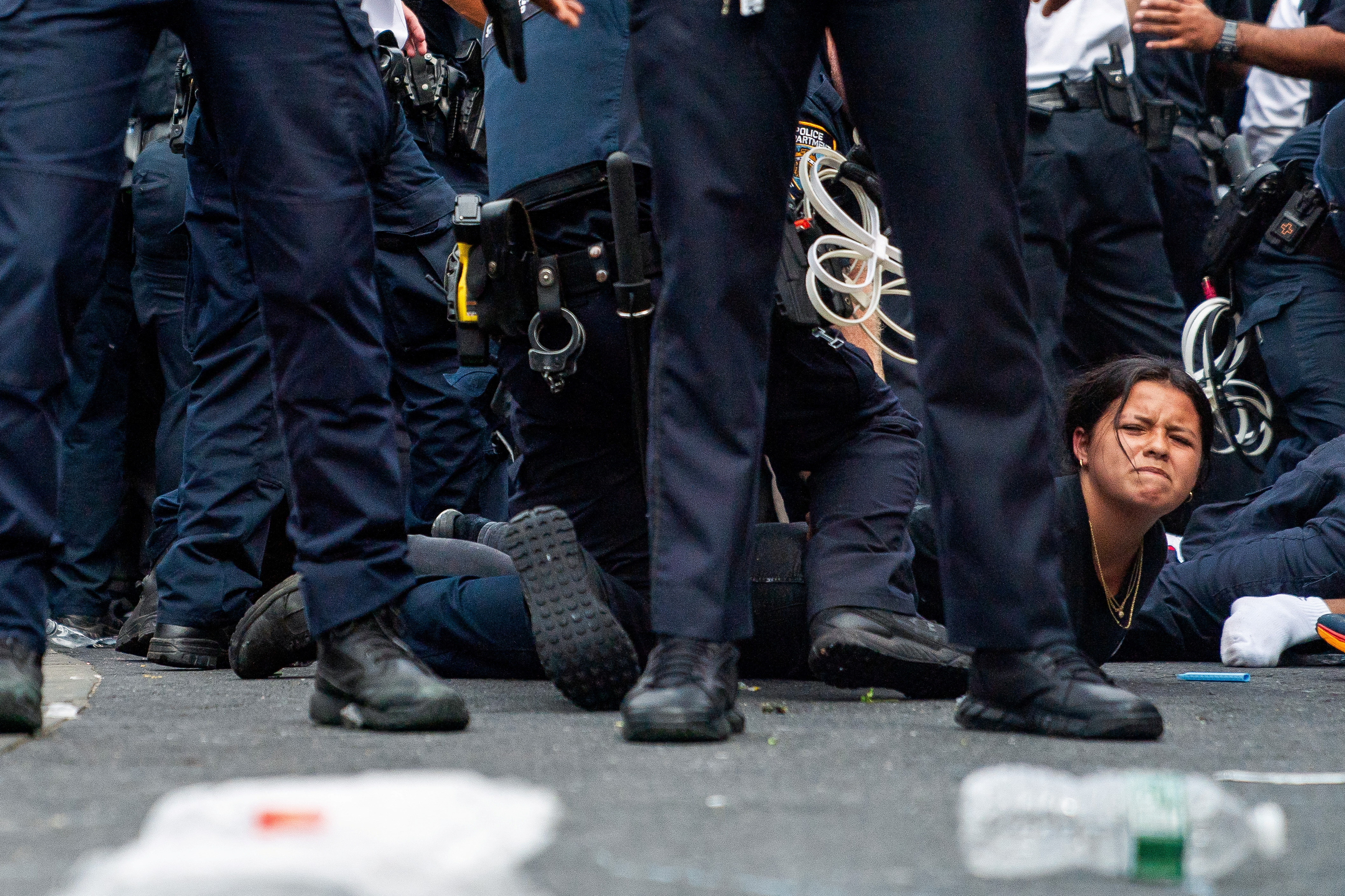 Police officers detain a person after popular live streamer Kai Cenat announced a "giveaway" event that grew chaotic, prompting police officers to respond and disperse the crowd at Union Square and the surrounding streets, in New York City, U.S. August 4, 2023. REUTERS/David 'Dee' Delgado