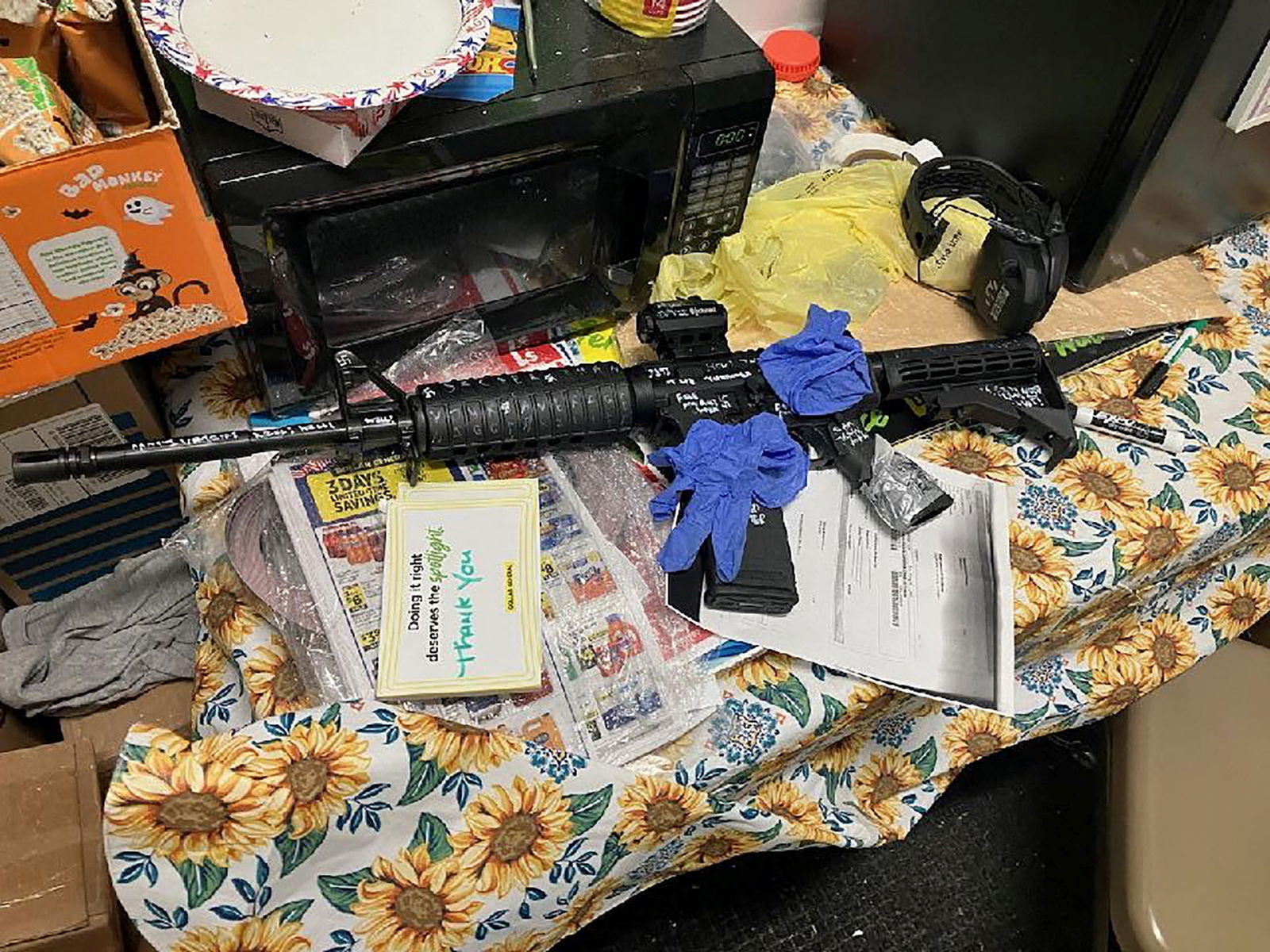 A recovered rifle lies on a table, after a white man armed with a high-powered rifle and a handgun killed three Black people before shooting himself at a Dollar General store, in what local law enforcement described as a racially motivated crime in Jacksonville, Florida, U.S., August 26, 2023. Jacksonville Sheriff’s Office/Handout via REUTERS