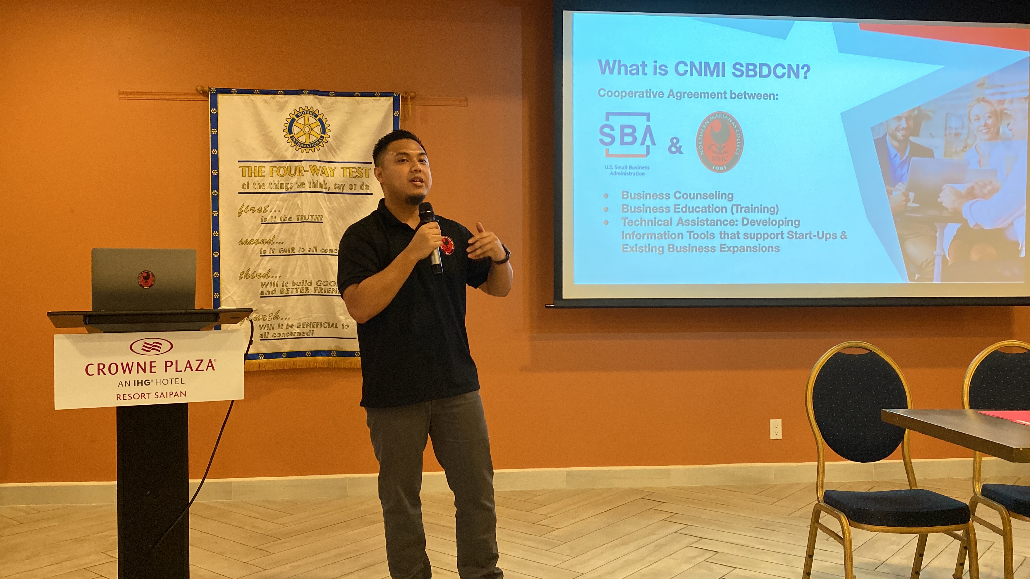 Roman Tudela speaks at a recent Rotary Club of Saipan meeting.