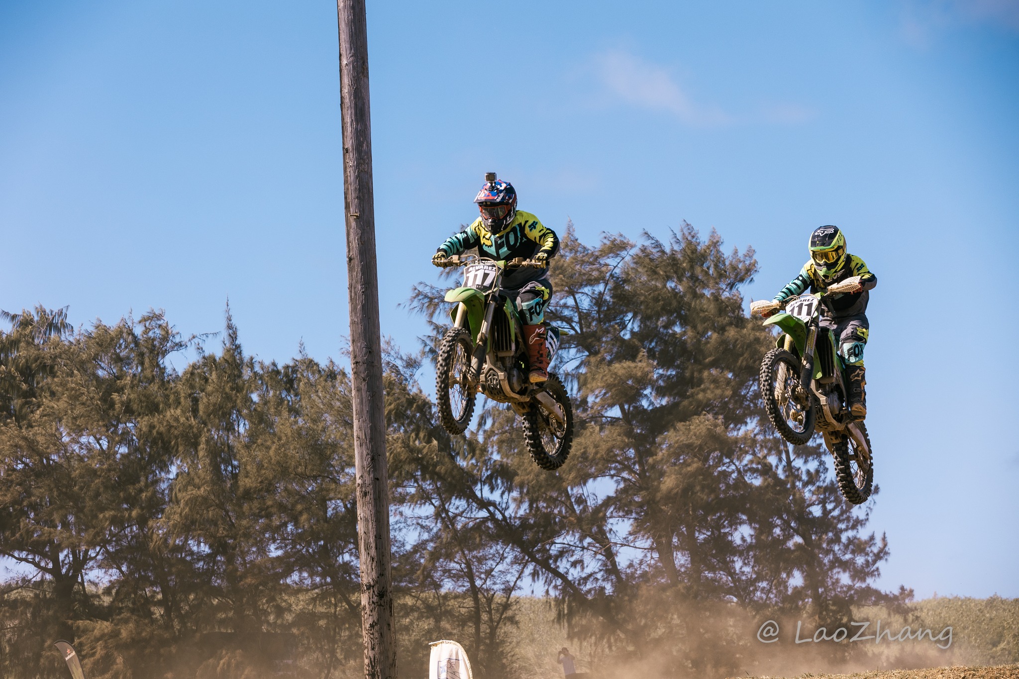 Shane and father Cuki Alvarez get some air time during an MRA race at  Cowtown Raceway Park.