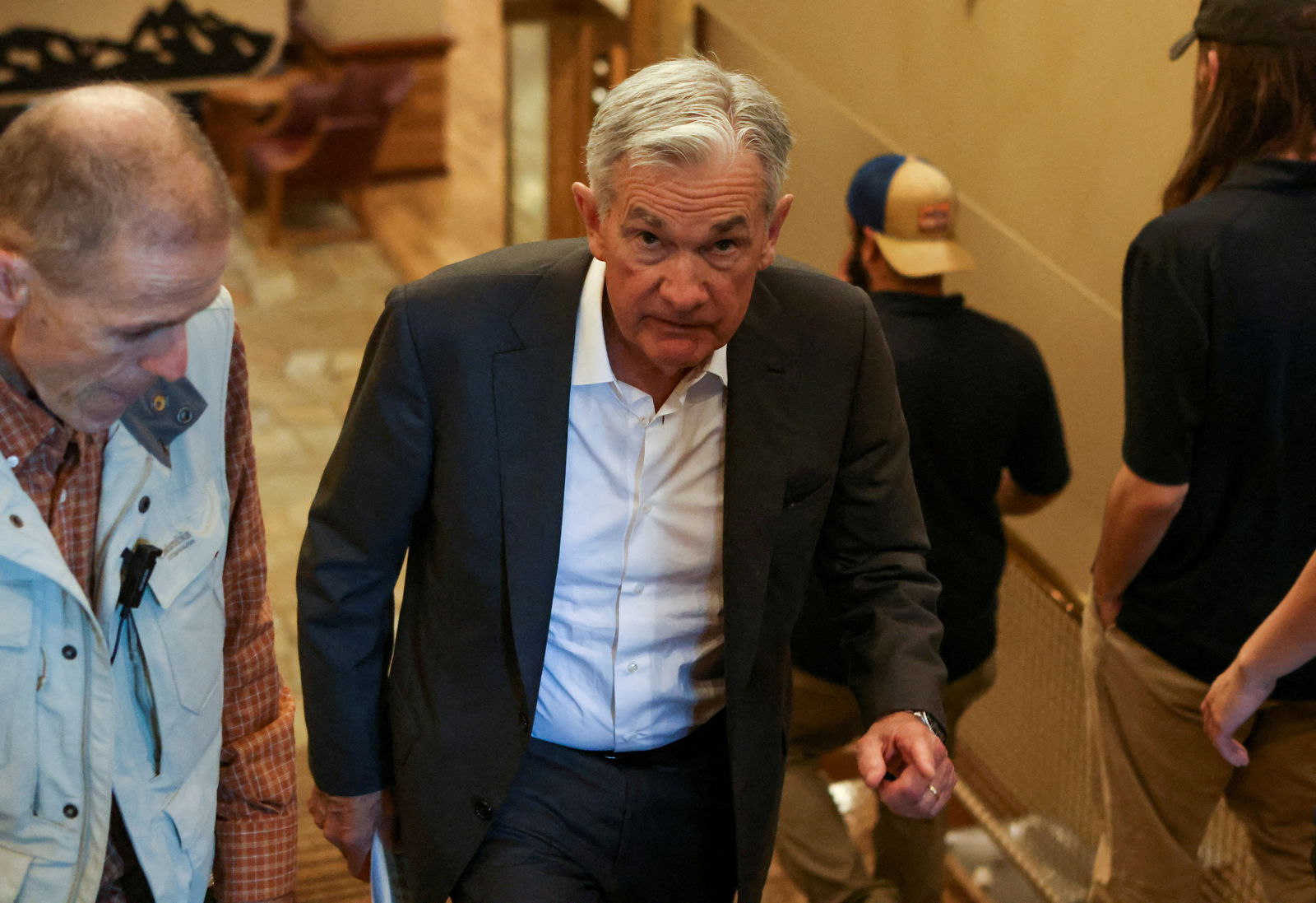 Federal Reserve Chair Jerome Powell walks in Teton National Park where financial leaders from around the world gathered for the Jackson Hole economic symposium outside Jackson, Wyoming, U.S., August 26, 2022. REUTERS/Jim Urquhart