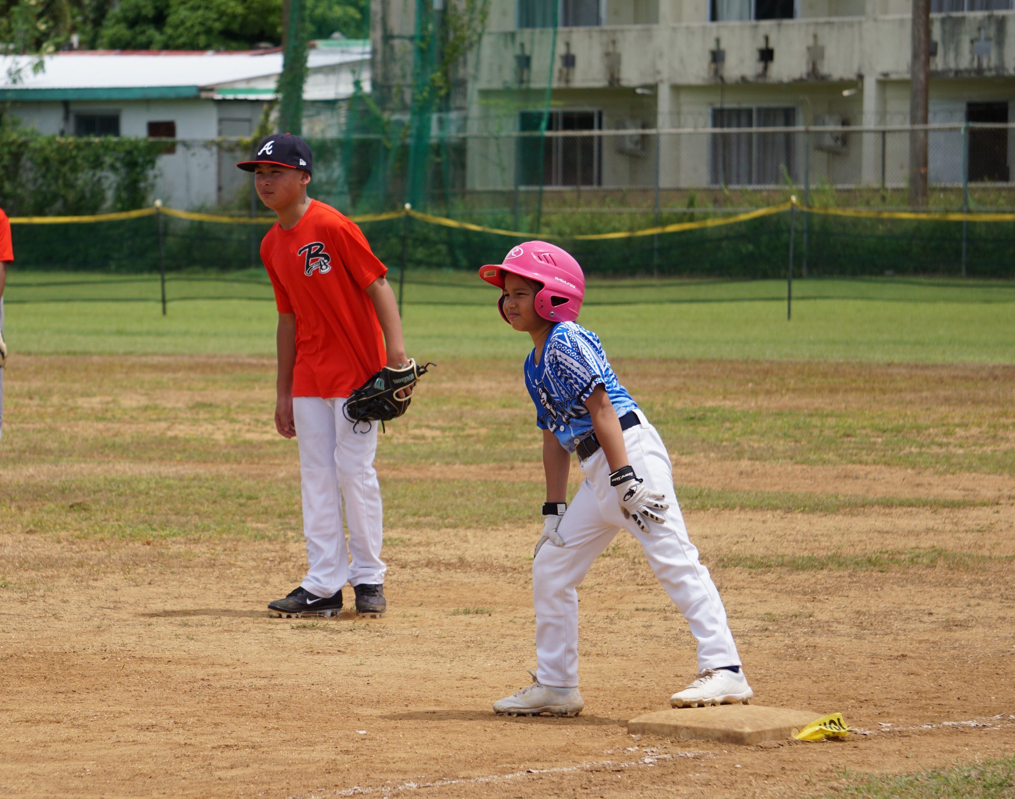 The Blue Jays' Karina Camacho reaches first base after hitting a single during a game in the 2023 Saipan Baseball League U12 Tournament at the Miguel "Tan Ge" Pangelinan Baseball Field.