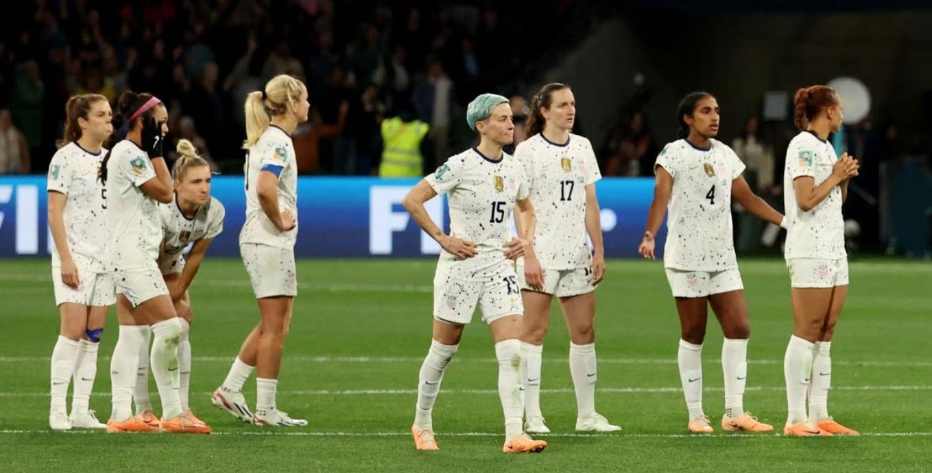Megan Rapinoe of the U.S. and teammates look dejected as their team is knocked out of the World Cup by Sweden at the Melbourne Rectangular Stadium, in Melbourne, Australia, Aug. 6, 2023.