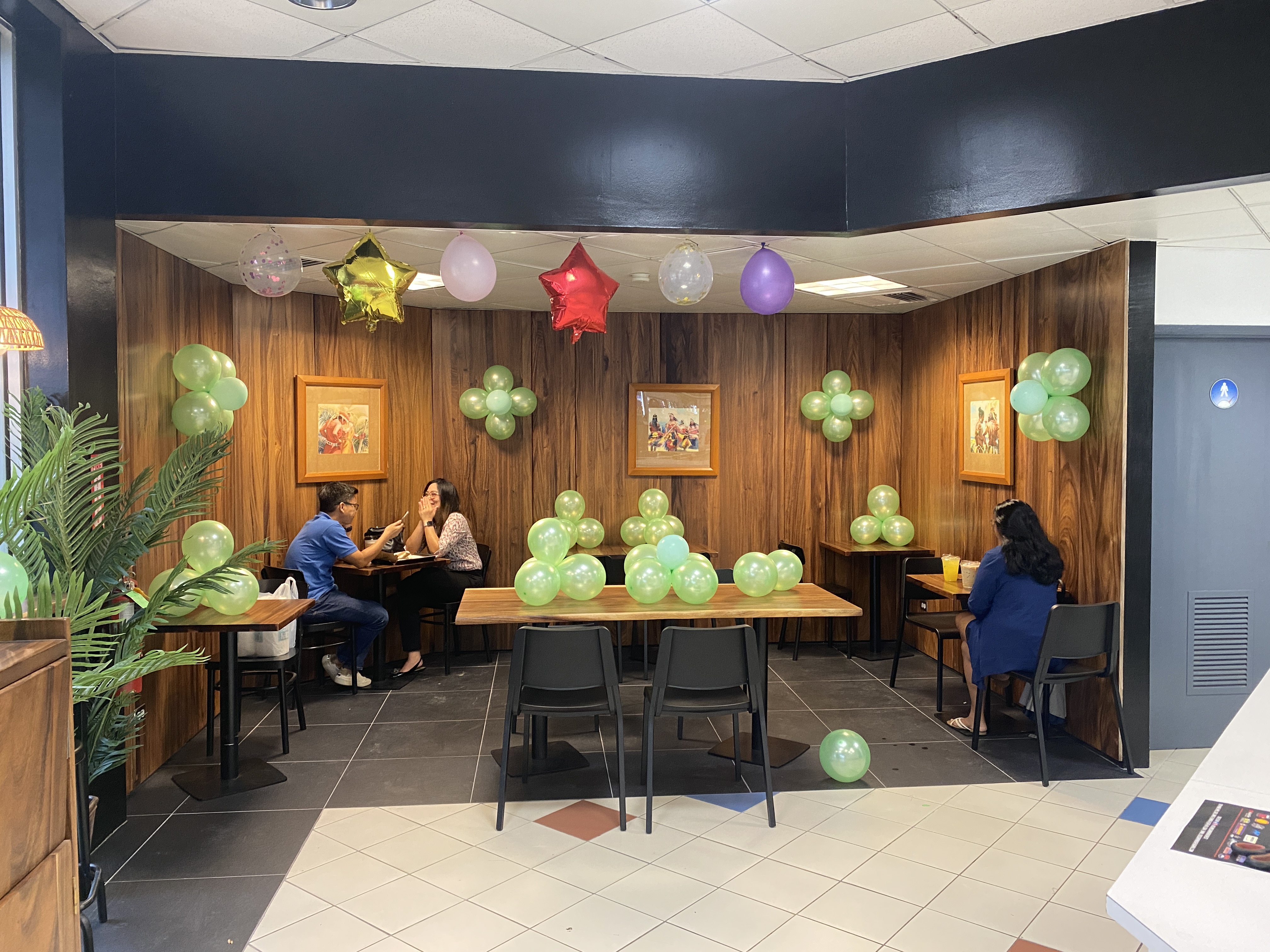 Customers enjoy the items they purchased at Cha Café's new location.