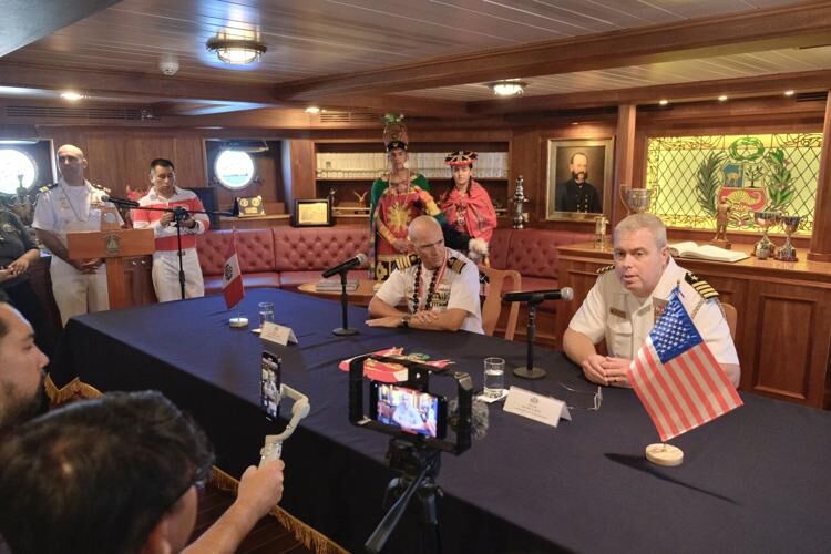 Capt. José Arce, left, commanding officer of the Peruvian navy's BAP Unión, and Capt. Michael A. Smith, Joint Region Marianas chief of staff, speak with media during a press conference Wednesday, Aug. 16, 2023, in the ship’s ward room at Victor Wharf on Naval Base Guam.