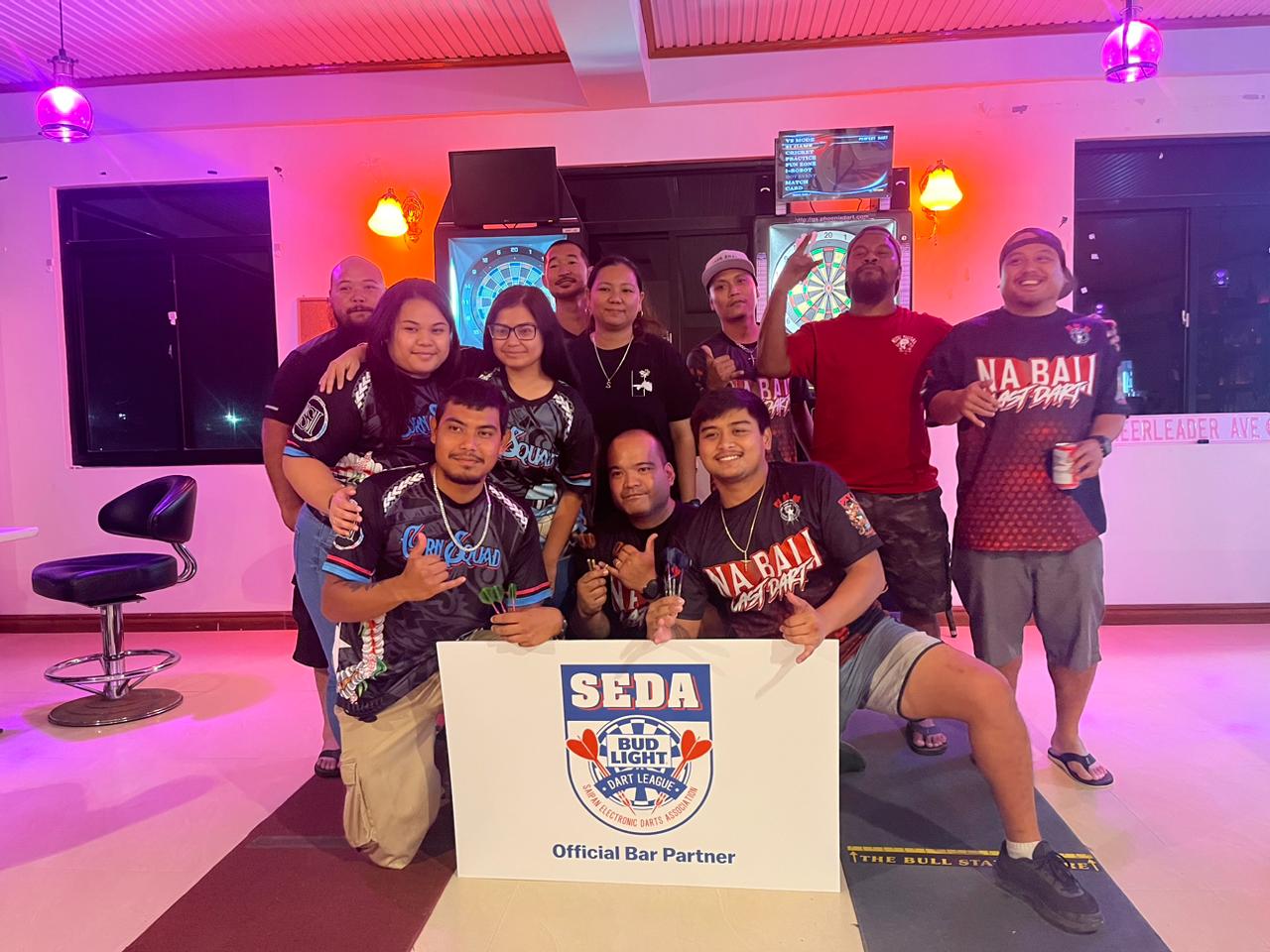 Spicy Thai Na Bali Last Dart and the Bistro Marianas Weekend Warriors pose for a photo on Wednesday after a C Chichirika division game of the 2023 SEDA Bud Light Dart League at the Spicy Thai Restaurant.