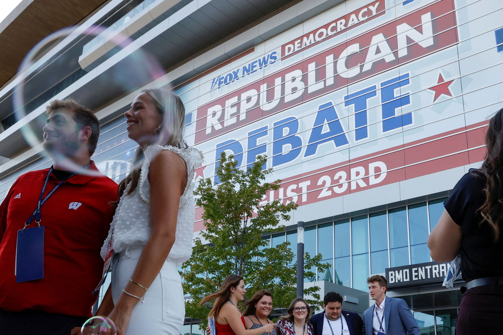 Attendees arrive at the debate hall to watch the Republican U.S. presidential candidates in their first primary debate of the 2024 campaign in Milwaukee, Wisconsin, U.S. August 23, 2023. REUTERS/Jonathan Ernst