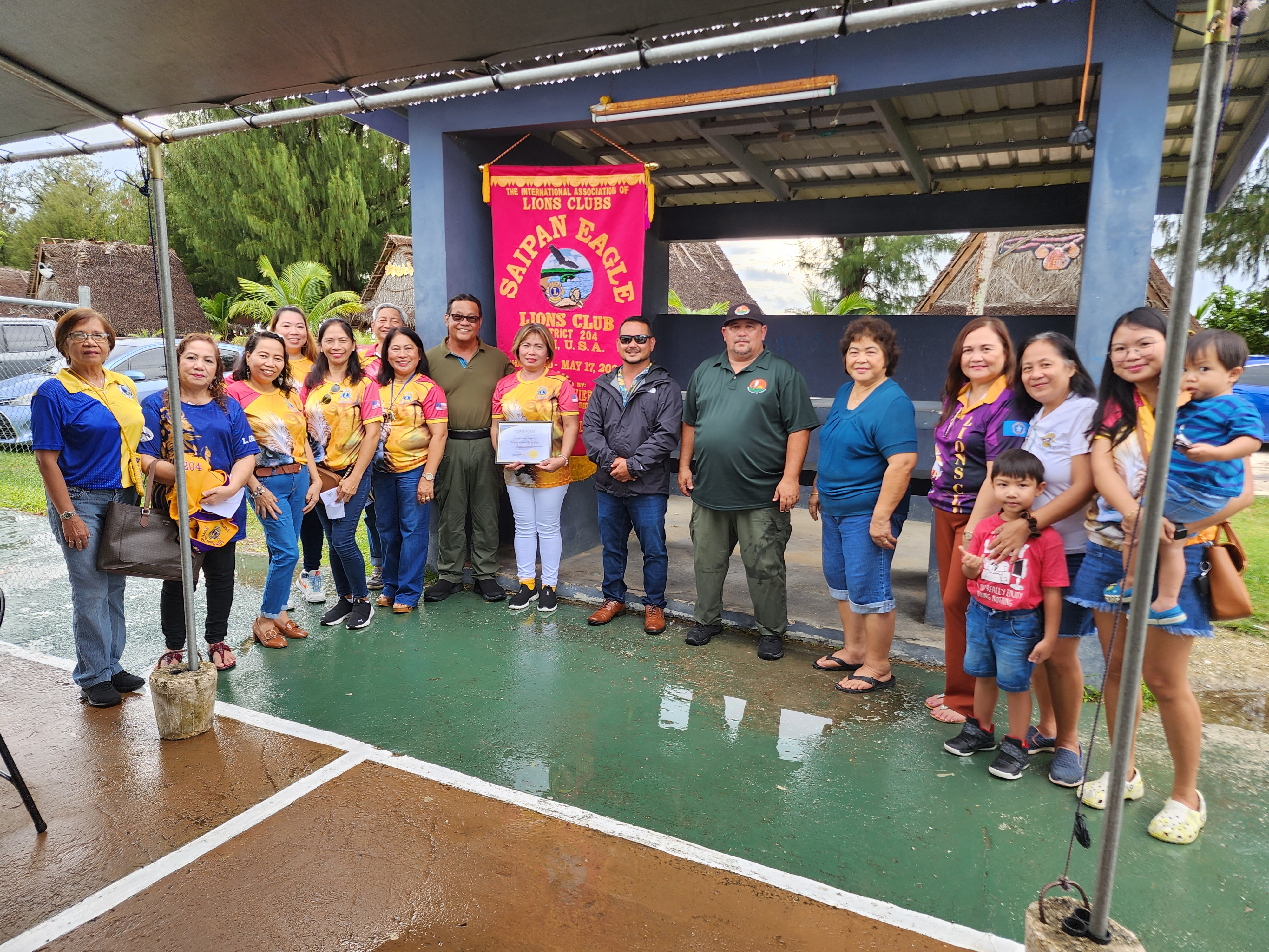 Saipan Eagles Lion Club members led by their president Marie Luna Javier pose with Saipan Mayor Ramon “RB” Camacho, Parks and Recreation Director Mike Cruz and Vice Speaker Joel Camacho during an adopt-a-place ceremony at the Civic Center basketball court in Susupe on Wednesday afternoon.          