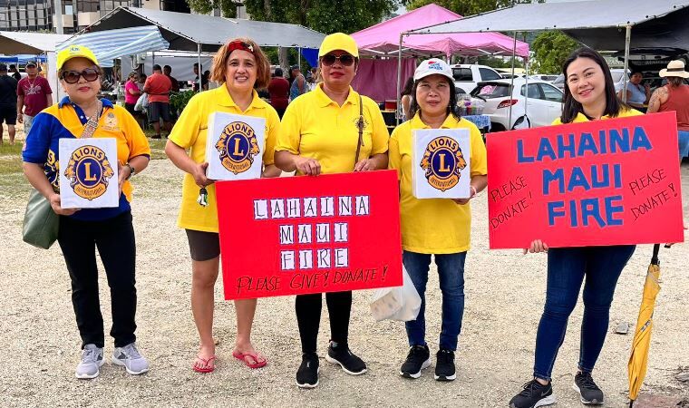 The Lions Clubs International District 204 conducts a coin drive at the Sabalu Market in Garapan.