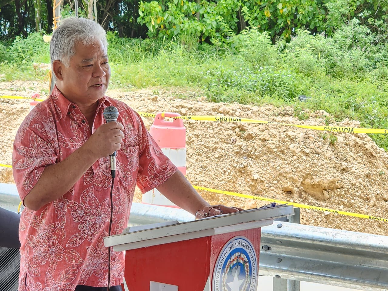 Gov. Arnold I. Palacios delivers his remarks during the ribbon-cutting ceremony for the opening of Windward/Kalabera Road on Tuesday.