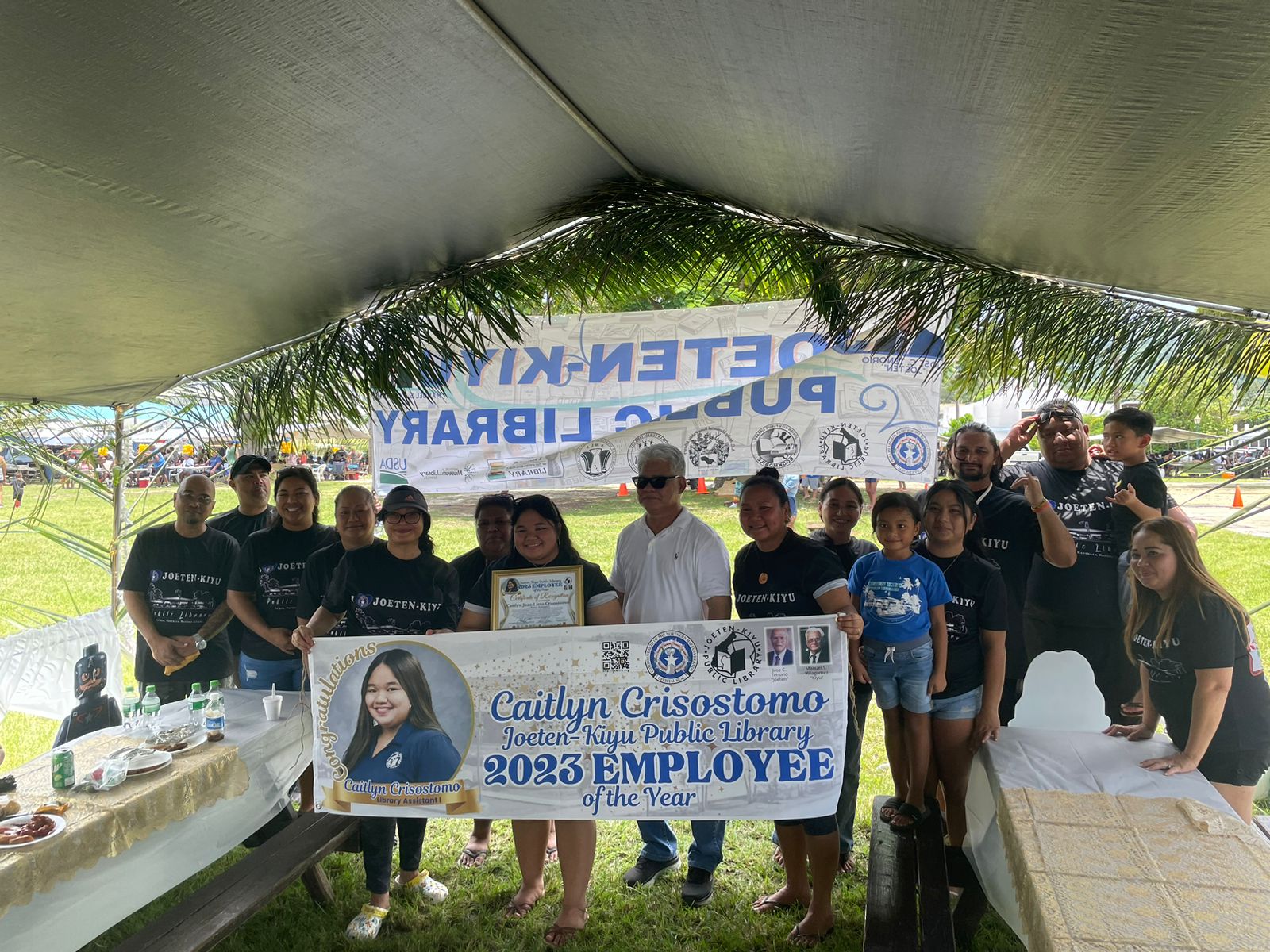 Team JKPL and Employee of the Year Caitlyn Crisostomo with Gov. Arnold I . Palacios.