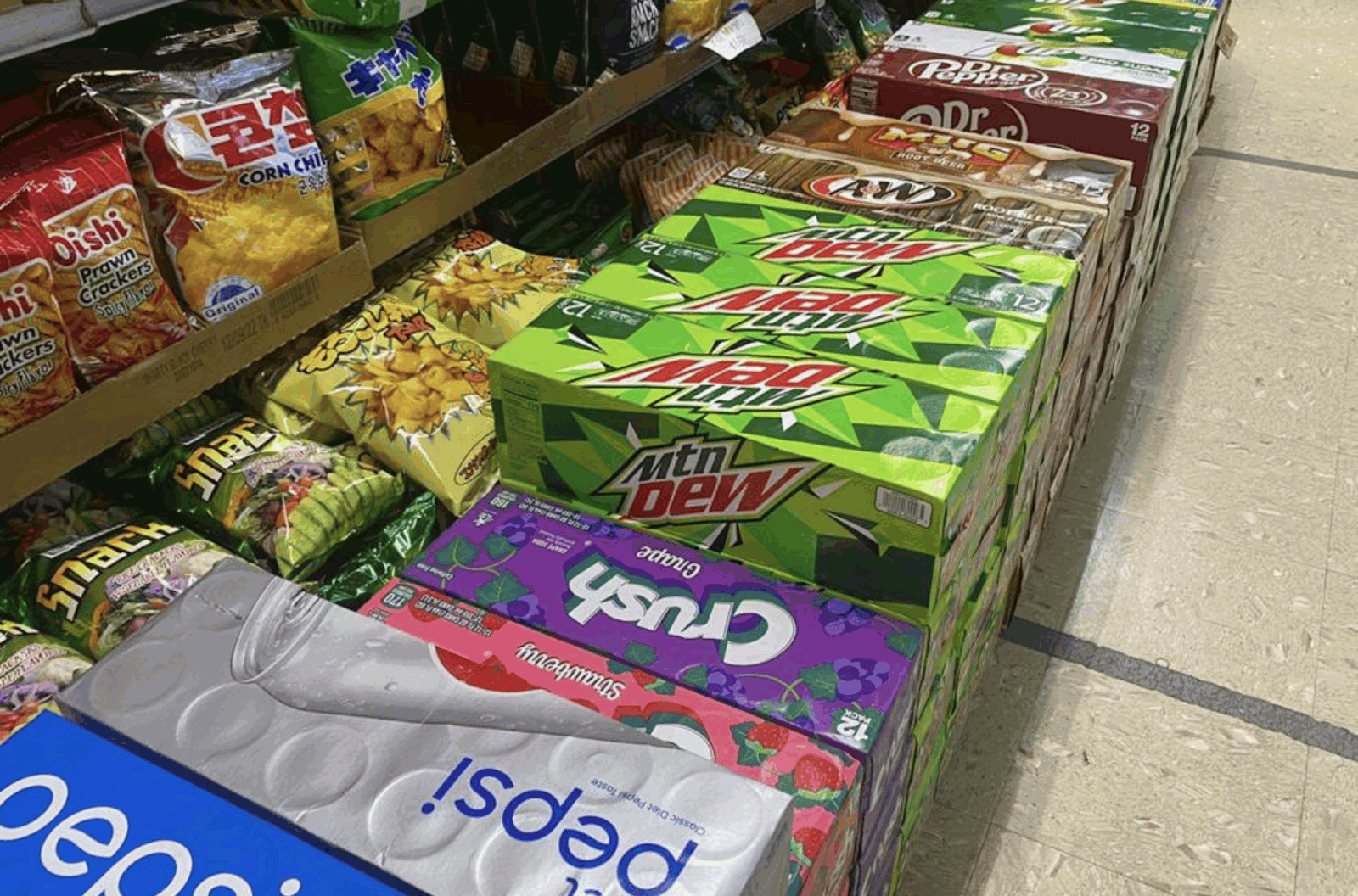 Cases of various sodas for sale are seen at Join Market in Hågat on May 15, 2023.