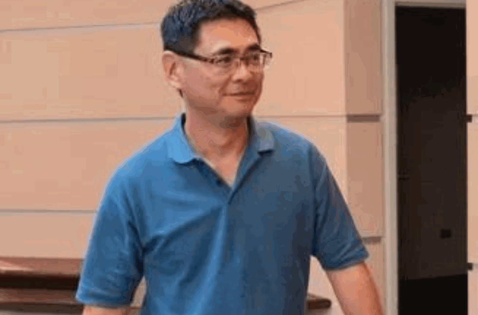 Masatomo "Tom" Nadeau, chief environmental health officer at the Department of Public Health and Social Services, arrives ahead of his court hearing on Tuesday, Aug. 29, 2023, at the Guam Judicial Center in Hagåtña.